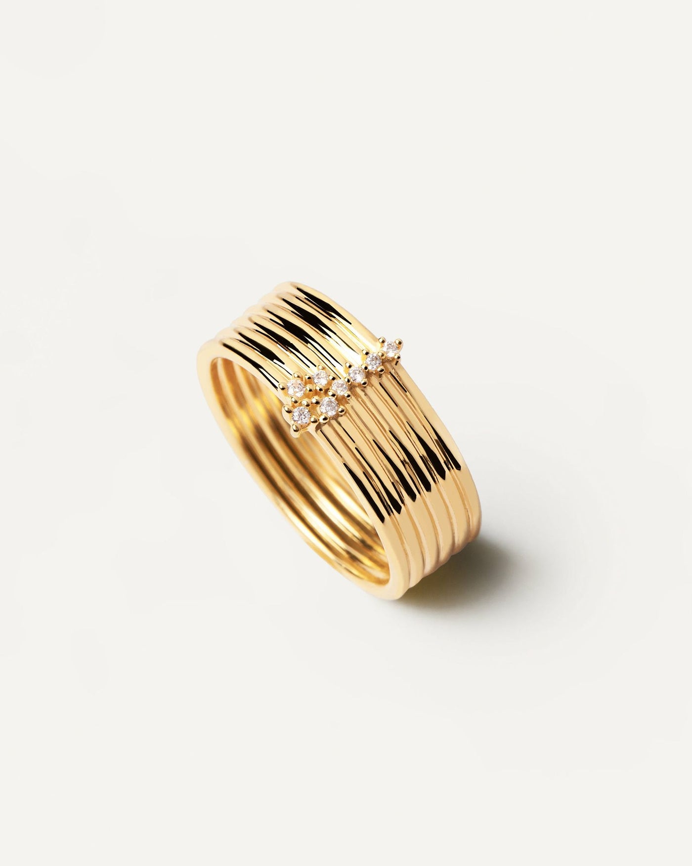 2024 Selection | Super Nova Ring. Statement ring in gold-plated silver with six bands and bright zirconia. Get the latest arrival from PDPAOLA. Place your order safely and get this Best Seller. Free Shipping.
