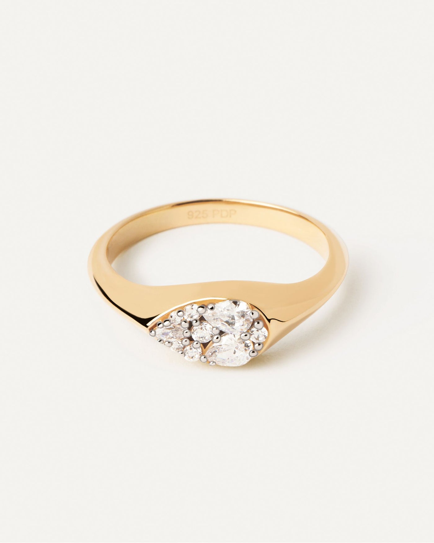 2024 Selection | Vanilla Stamp Ring. Gold-plated signet ring set with pear shape white zirconia multi-stone cluster. Get the latest arrival from PDPAOLA. Place your order safely and get this Best Seller. Free Shipping.