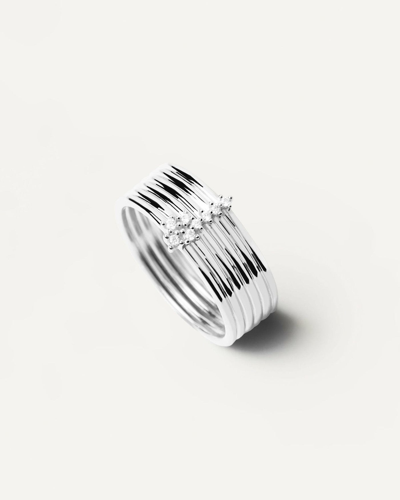 2024 Selection | Super Nova Silver Ring. Statement ring in sterling silver with six bands and bright zirconia. Get the latest arrival from PDPAOLA. Place your order safely and get this Best Seller. Free Shipping.