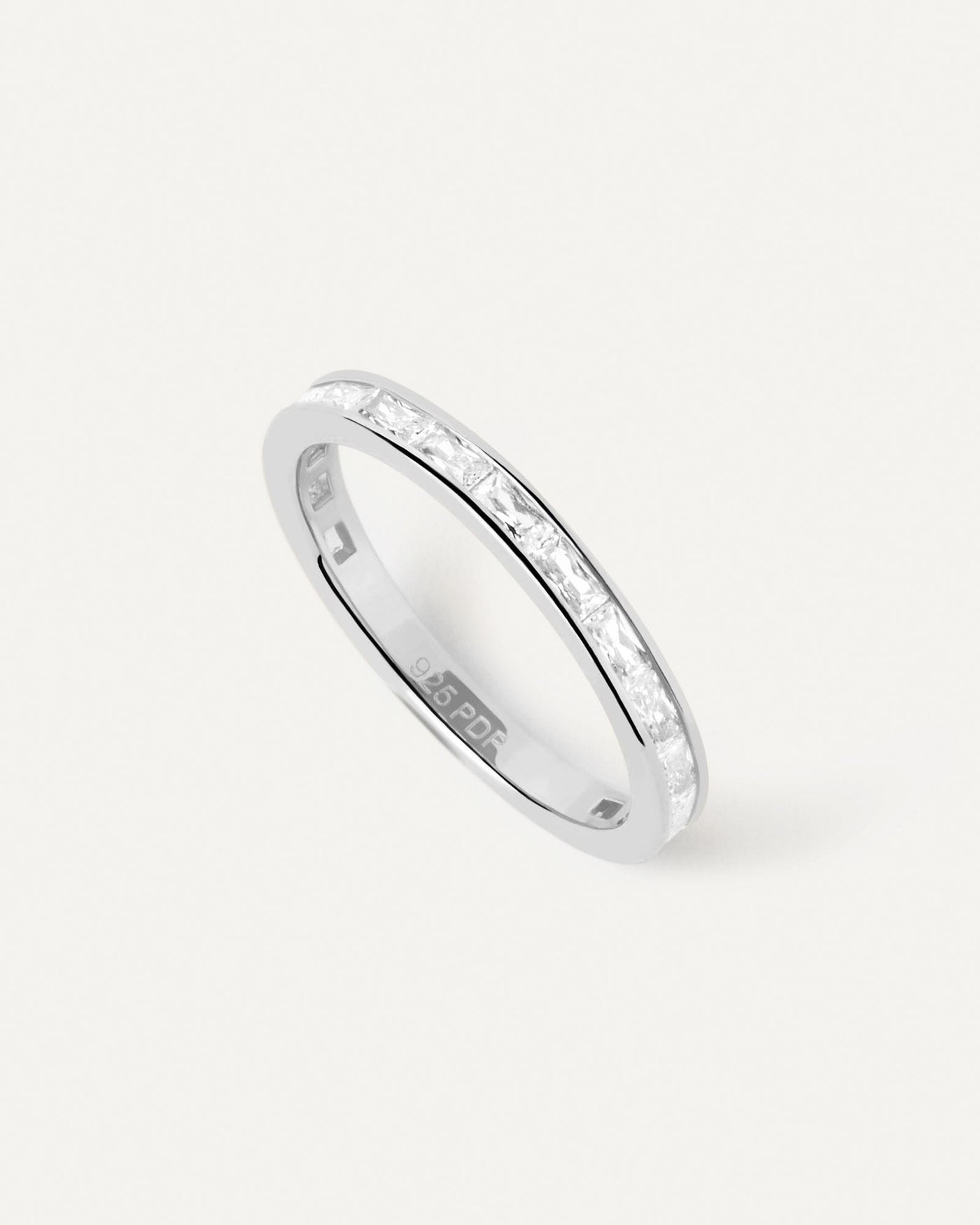2024 Selection | Viena Silver Ring. Silver eternity ring set with rectangular cut white zirconia. Get the latest arrival from PDPAOLA. Place your order safely and get this Best Seller. Free Shipping.