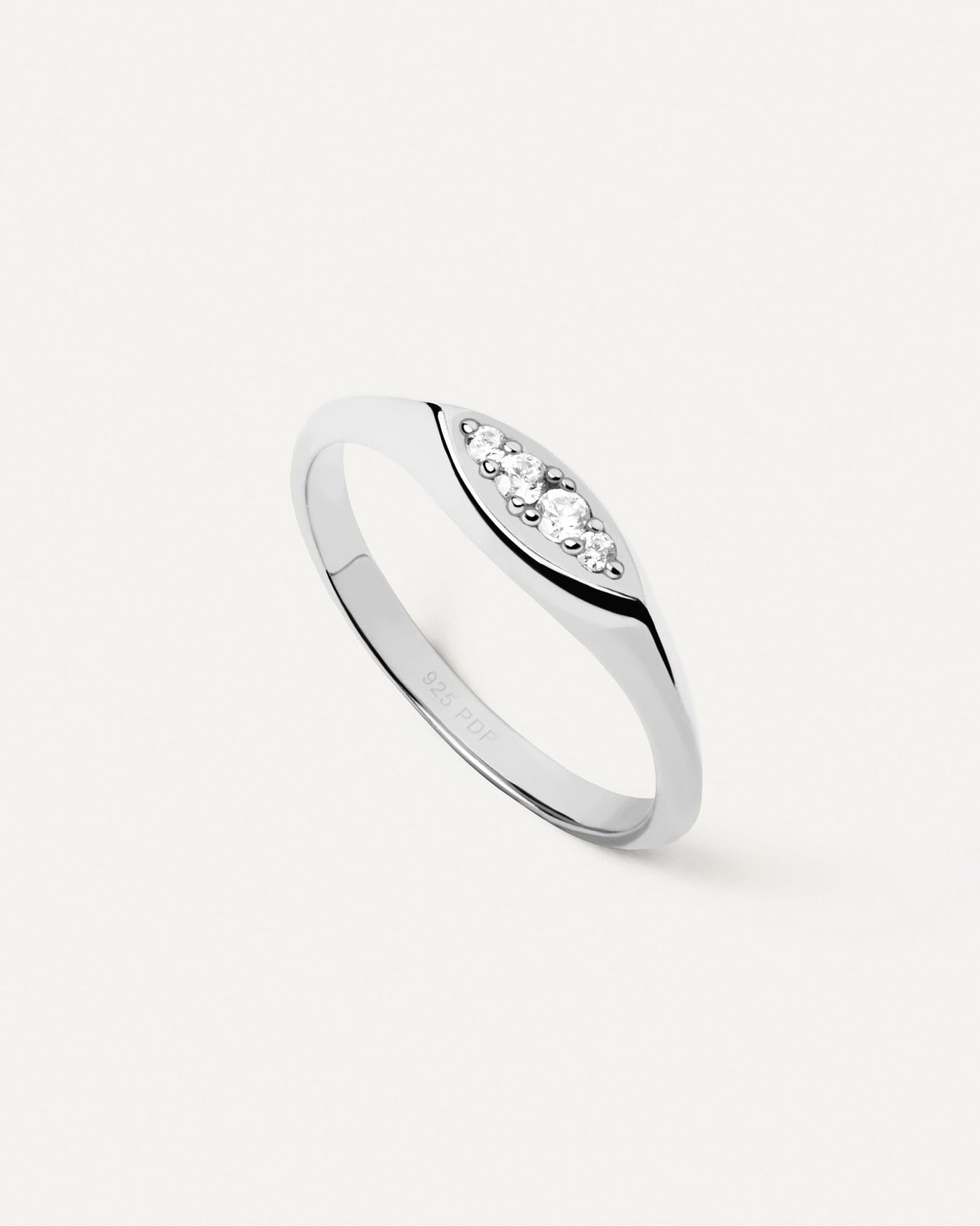 2024 Selection |  Gala Stamp Silver Ring. Sterling silver slim signet ring set with eye shape white zirconia multi-stone cluster. Get the latest arrival from PDPAOLA. Place your order safely and get this Best Seller. Free Shipping.
