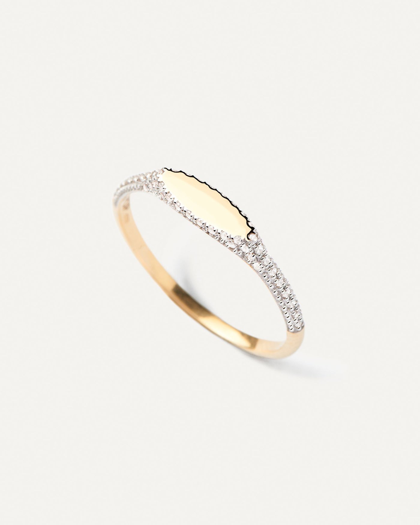 2024 Selection | Diamonds and Gold Tess Stamp Ring. Slim signet ring in solid 18K yellow gold set with pavé diamonds of 0.15 carats . Get the latest arrival from PDPAOLA. Place your order safely and get this Best Seller. Free Shipping.