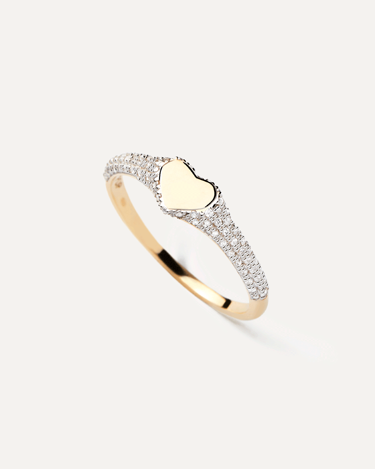 2024 Selection | Diamonds and Gold Heart Stamp Ring. Heart-shaped signet ring in solid yellow gold set with 76 pavé diamonds of 0.23 carats. Get the latest arrival from PDPAOLA. Place your order safely and get this Best Seller. Free Shipping.