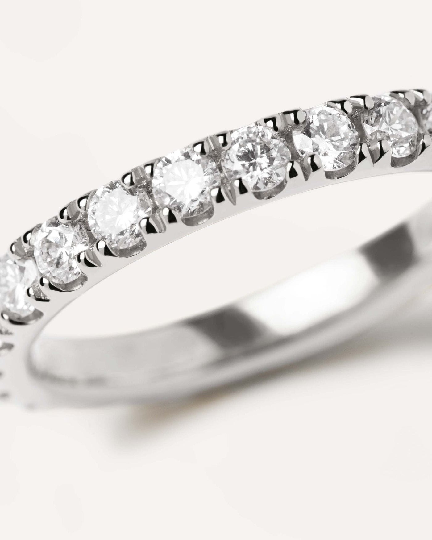 2024 Selection | Diamonds and White Gold Eternity Supreme Ring. 18K white gold eternity ring, set with big lab-grown diamonds, equaling 1.55 carats. Get the latest arrival from PDPAOLA. Place your order safely and get this Best Seller. Free Shipping.