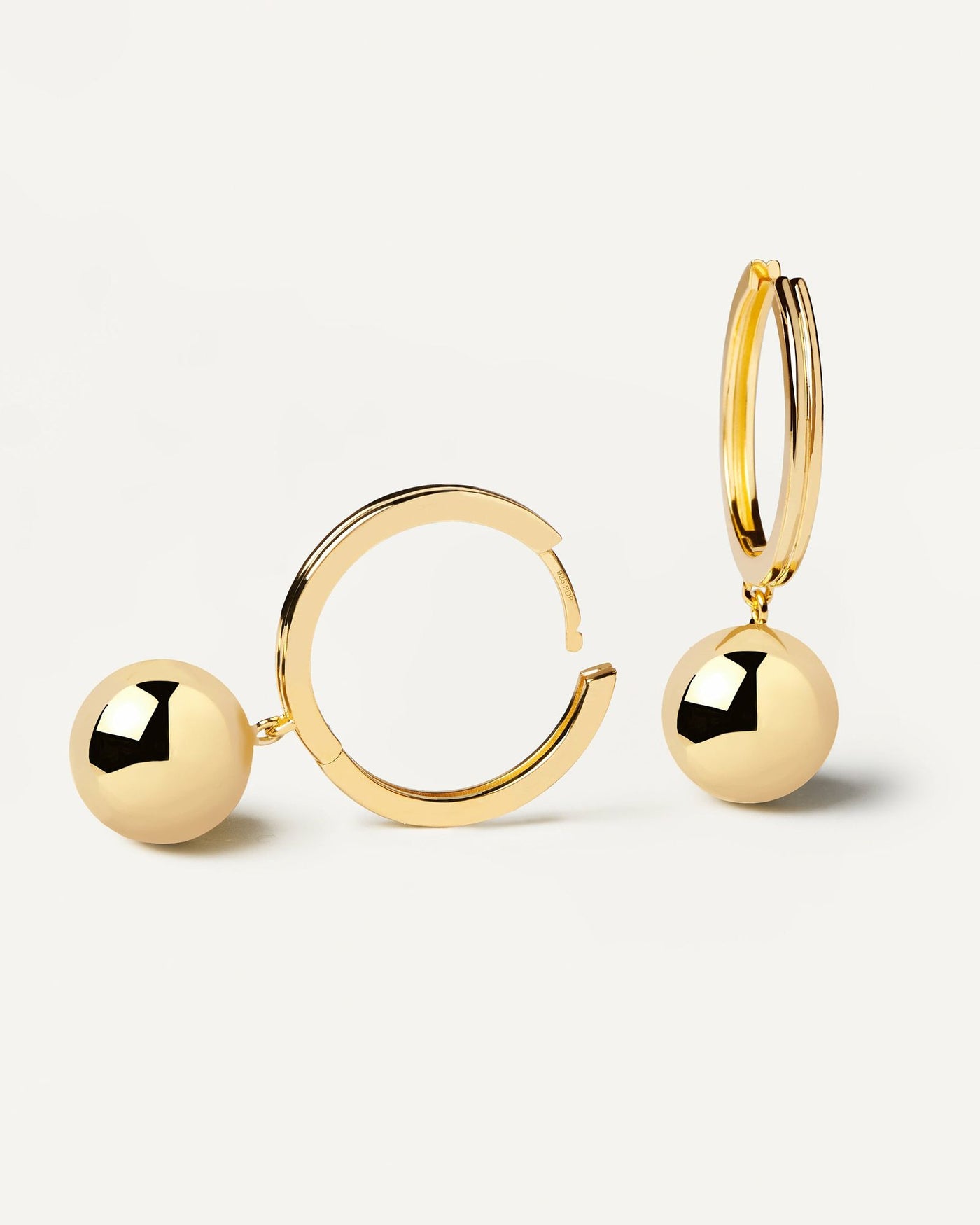 2024 Selection | Super Future Earrings. Gold-plated silver hoop earrings with hanging ball. Get the latest arrival from PDPAOLA. Place your order safely and get this Best Seller. Free Shipping.