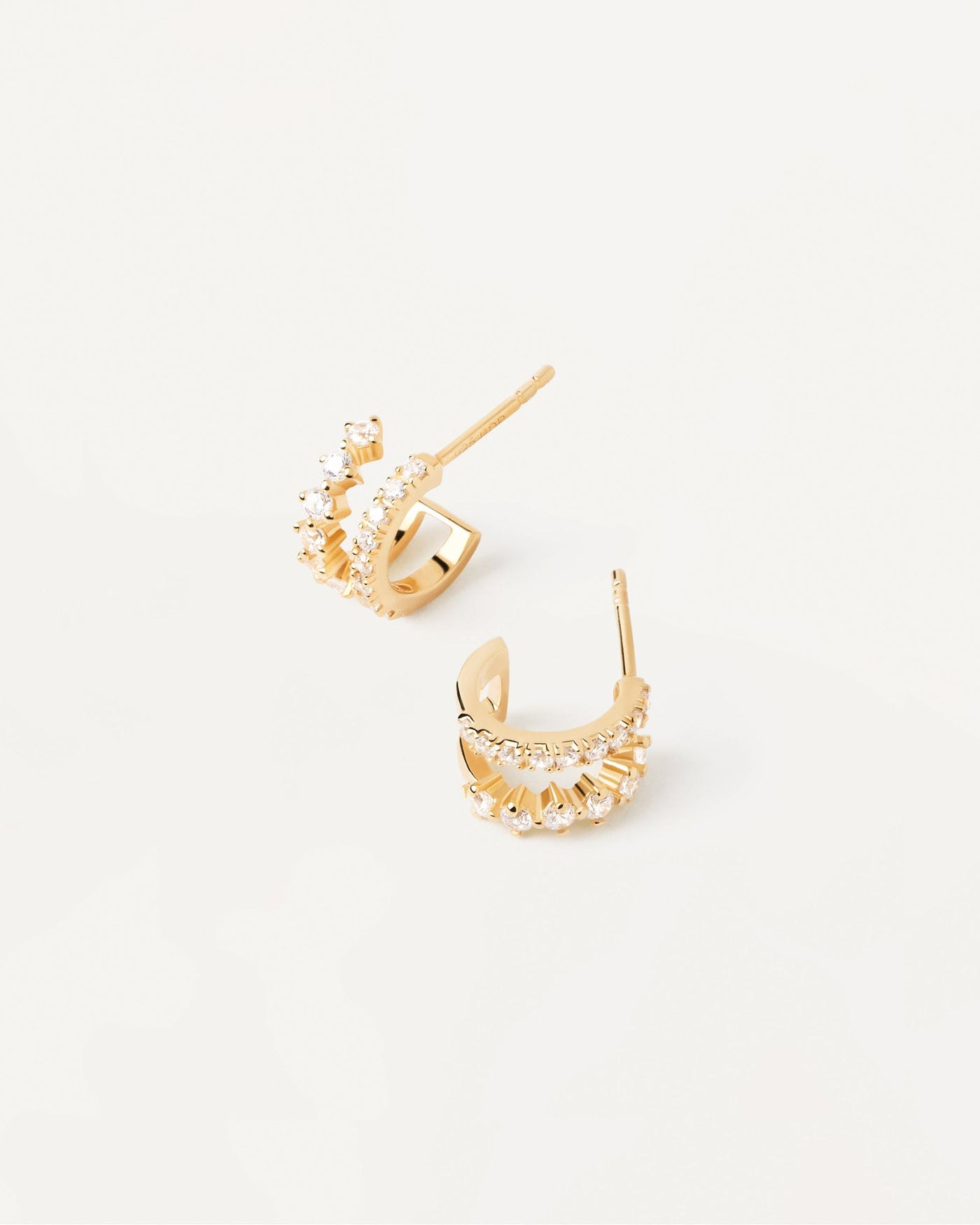 2024 Selection | Rubi Earrings. Double eternity hoops in gold-plated silver with white zirconia. Get the latest arrival from PDPAOLA. Place your order safely and get this Best Seller. Free Shipping.
