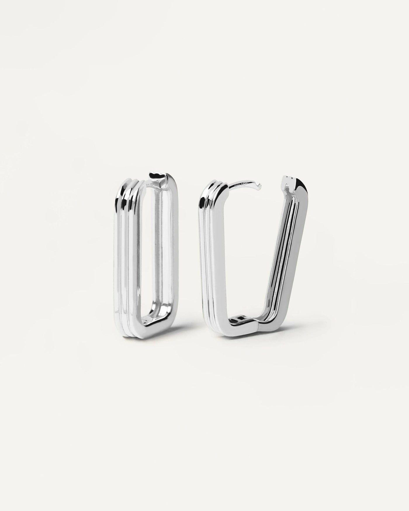 2024 Selection | Super Nova Silver Earrings. Squarred hoops in sterling silver with 3 bands design. Get the latest arrival from PDPAOLA. Place your order safely and get this Best Seller. Free Shipping.