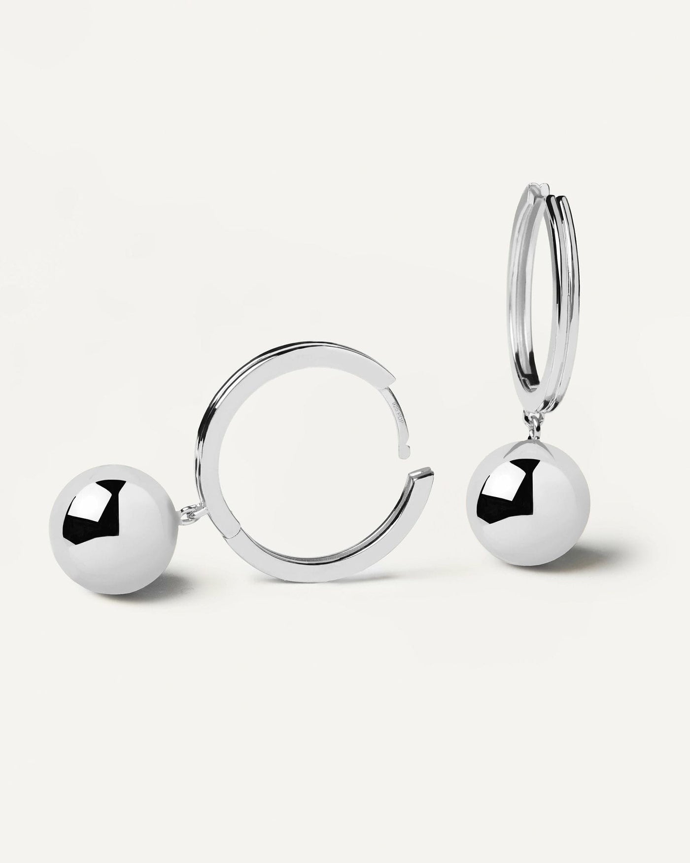 2024 Selection | Super Future Silver Earrings. Sterling silver hoop earrings with hanging ball. Get the latest arrival from PDPAOLA. Place your order safely and get this Best Seller. Free Shipping.