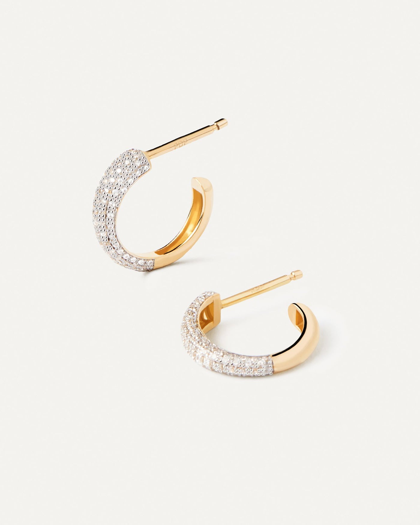 2024 Selection | Diamonds and Gold Soho Mini Hoops. Small hoop earrings in solid yellow gold with 81 pavé diamonds of 0.23 carats. Get the latest arrival from PDPAOLA. Place your order safely and get this Best Seller. Free Shipping.