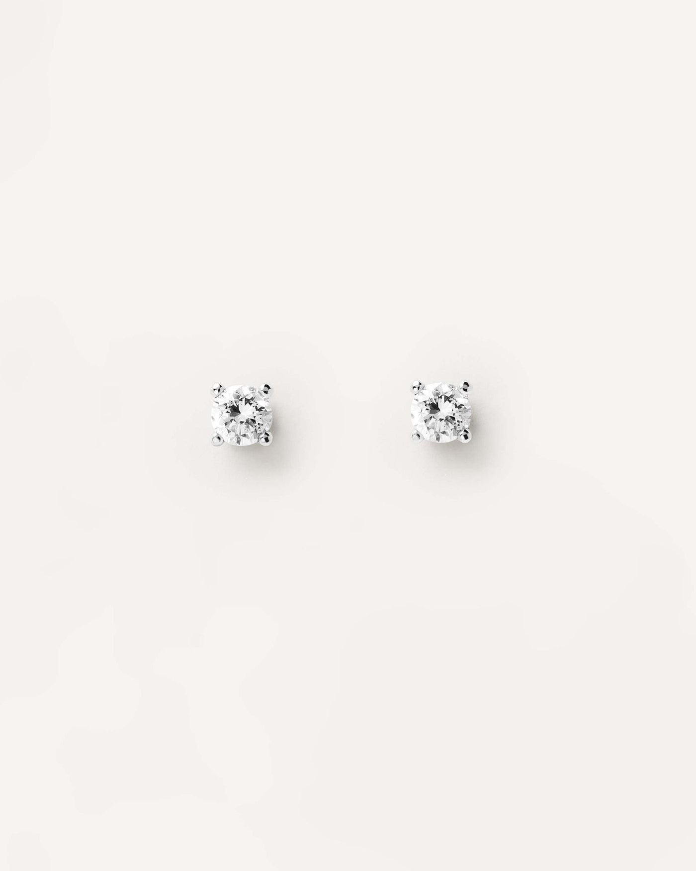 2024 Selection | Diamonds and White Gold Solitaire Studs. 18K white gold pin earrings with lab-grown solitary diamond of 0.10 carat each. Get the latest arrival from PDPAOLA. Place your order safely and get this Best Seller. Free Shipping.
