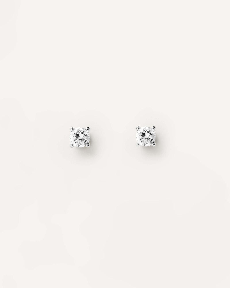 Diamonds and White Gold Solitaire Studs - 
  
    18K White gold / Rhodium silver plating
  
