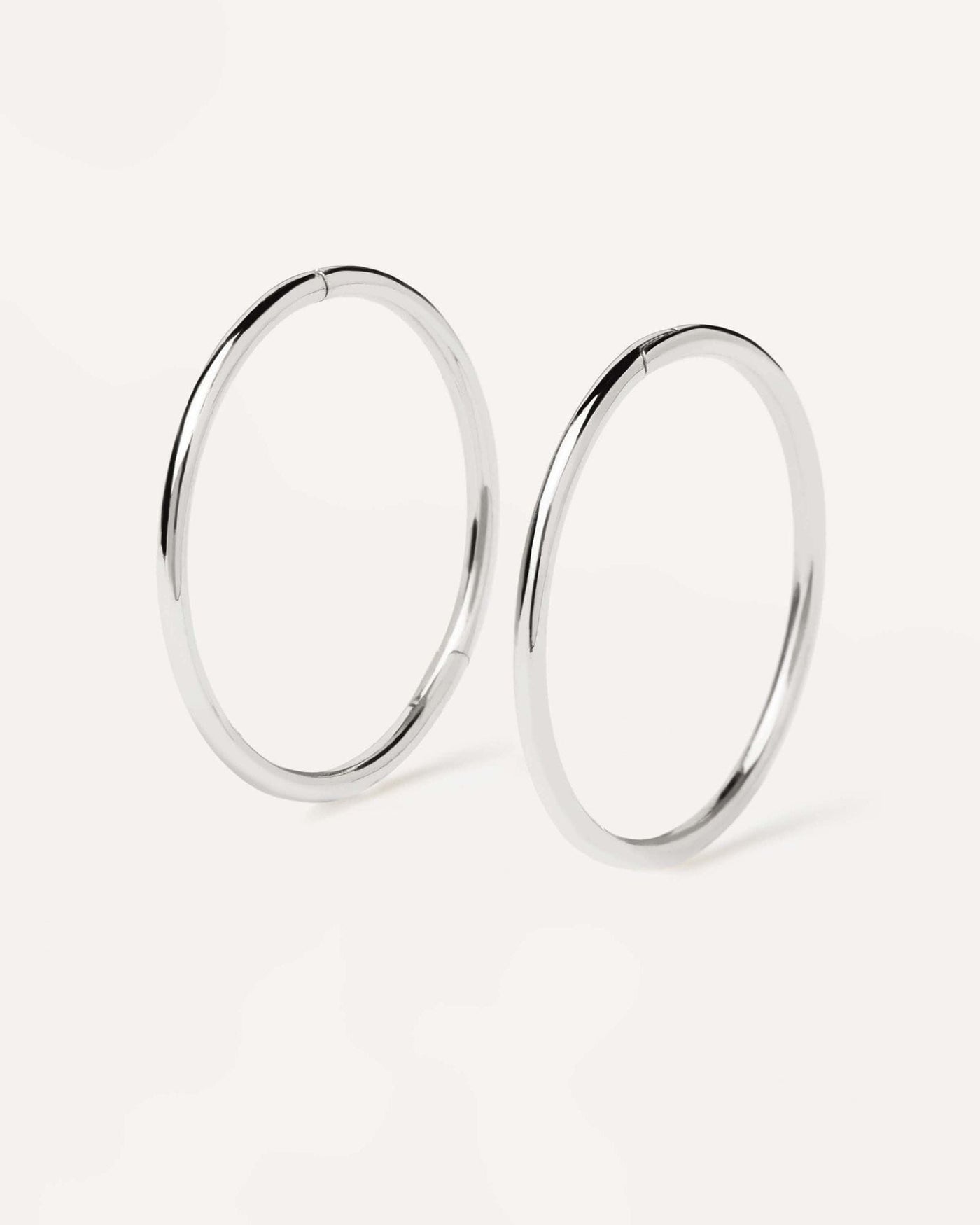 2024 Selection | White Gold Essential Mini Hoops. Perfect circle small hoops with plain design, made of recycled white gold. Get the latest arrival from PDPAOLA. Place your order safely and get this Best Seller. Free Shipping.