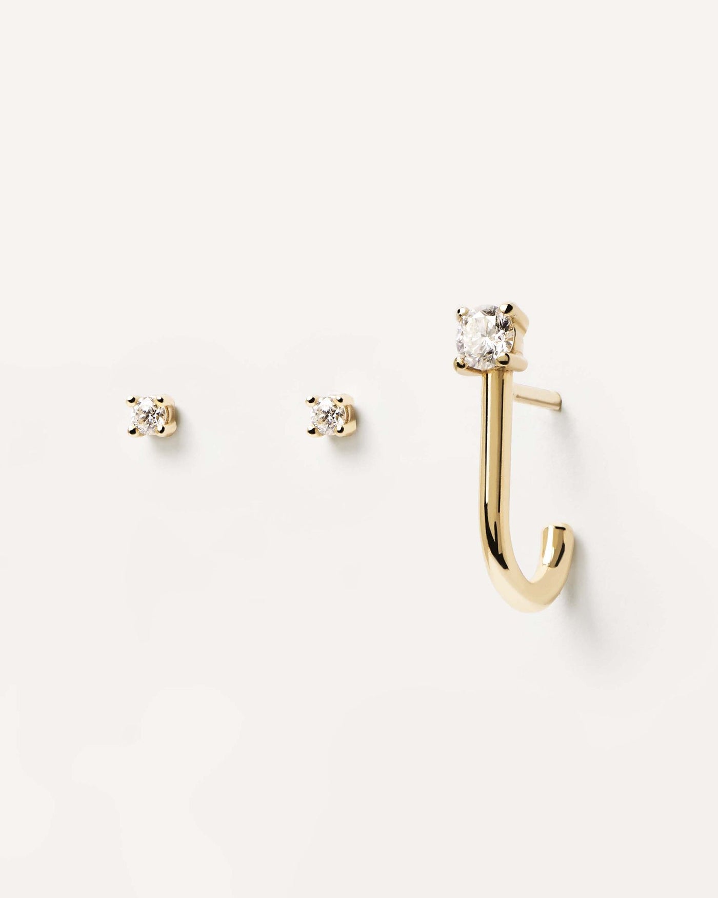 2024 Selection | Diamonds and Gold Solitaire Earrings Set. Solid yellow gold earring set with 3 individual diamond solitaire studs, making 0.16 carats. Get the latest arrival from PDPAOLA. Place your order safely and get this Best Seller. Free Shipping.