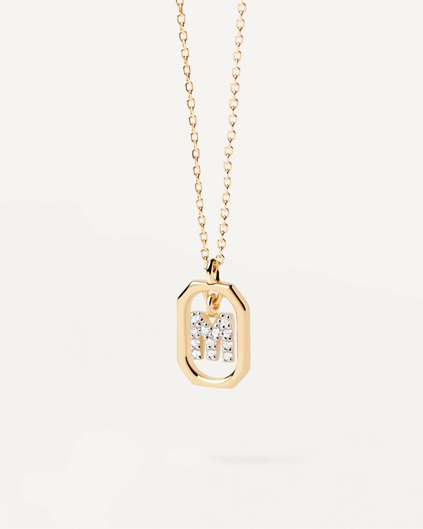 2024 Selection | Mini Letter M Necklace. Small initial M necklace in zirconia inside gold-plated silver octagonal pendant. Get the latest arrival from PDPAOLA. Place your order safely and get this Best Seller. Free Shipping.