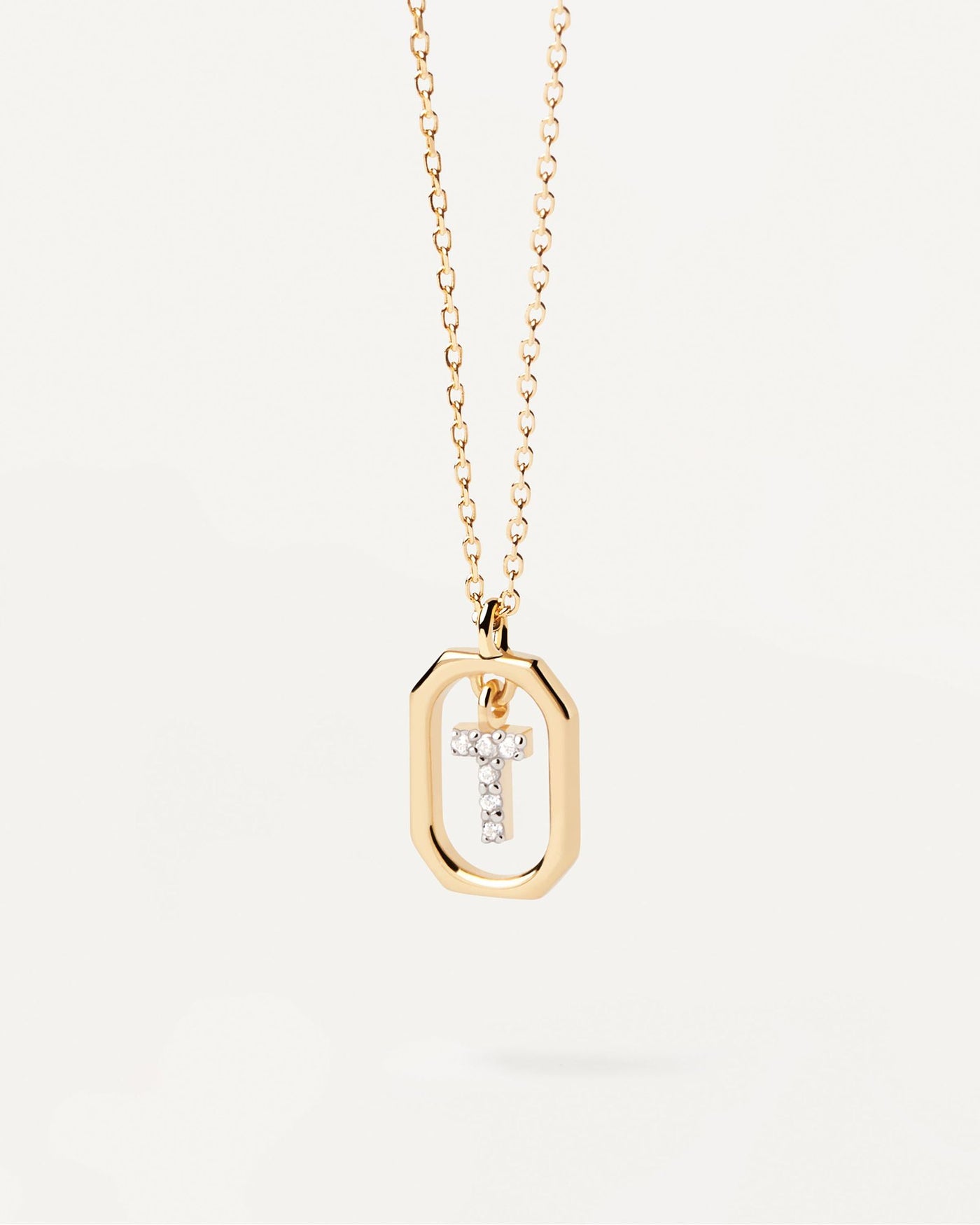 2024 Selection | Mini Letter T Necklace. Small initial T necklace in zirconia inside gold-plated silver octagonal pendant. Get the latest arrival from PDPAOLA. Place your order safely and get this Best Seller. Free Shipping.