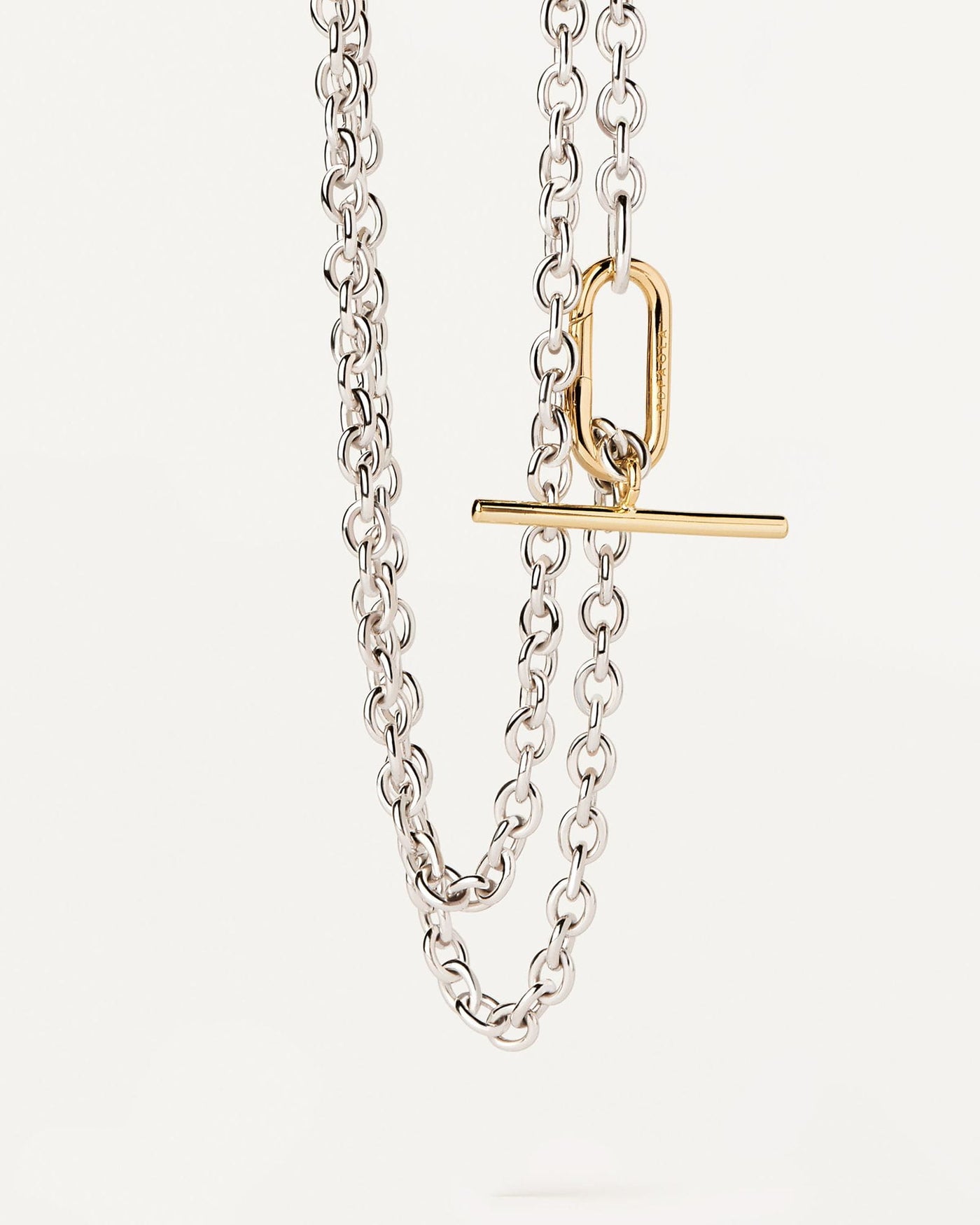 2024 Selection | Long Beat Chain Necklace. Bicolor T-bar double chain necklace with silver links and gold-plated clasp. Get the latest arrival from PDPAOLA. Place your order safely and get this Best Seller. Free Shipping.