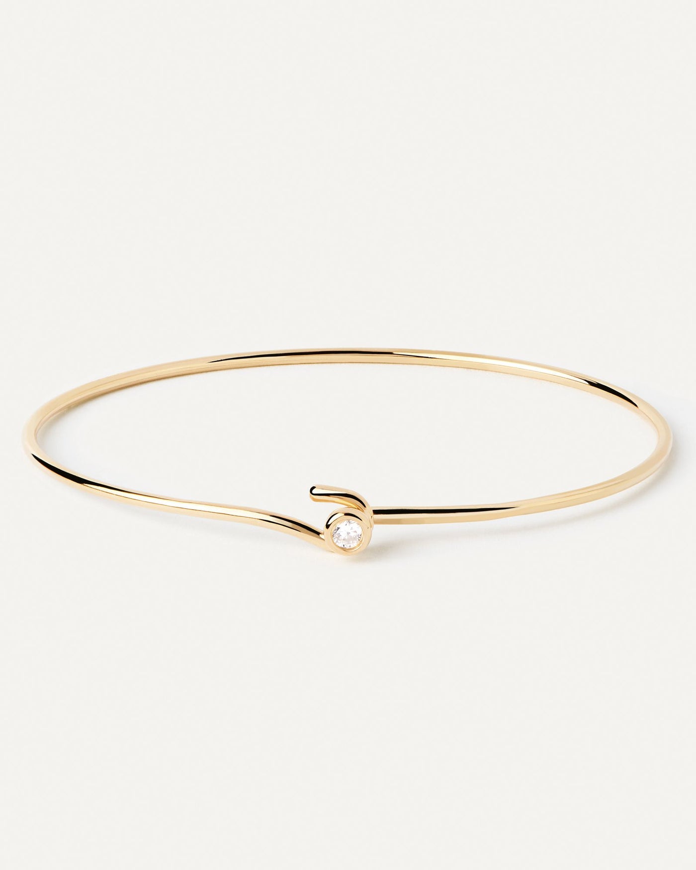 2024 Selection | Siena Bangle. Gold-plated slim hook bangle topped with white zirconia. Get the latest arrival from PDPAOLA. Place your order safely and get this Best Seller. Free Shipping.