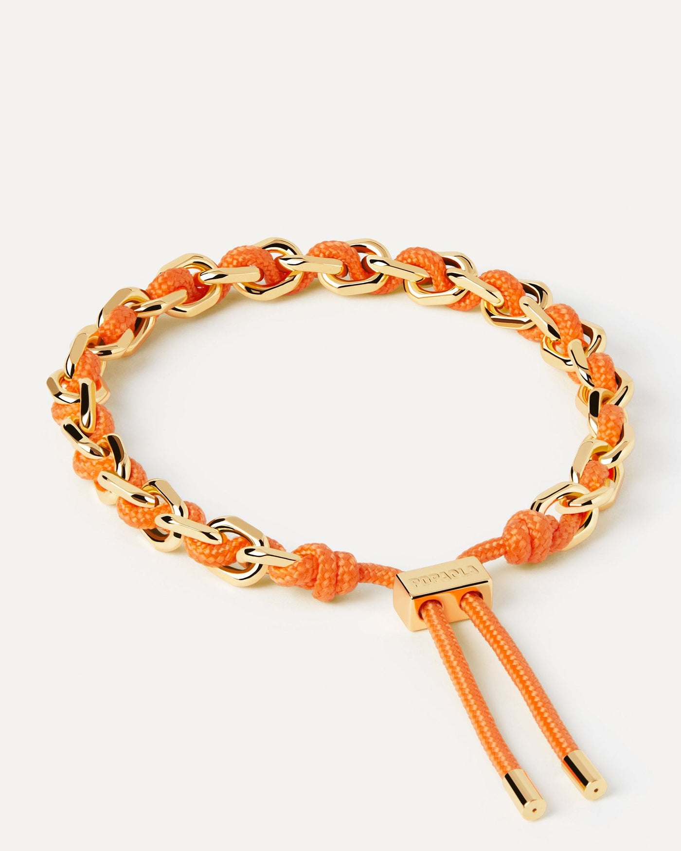 2024 Selection | Tangerine Rope and Chain Bracelet. Golden chain bracelet with an orange rope adjustable sliding clasp. Get the latest arrival from PDPAOLA. Place your order safely and get this Best Seller. Free Shipping.