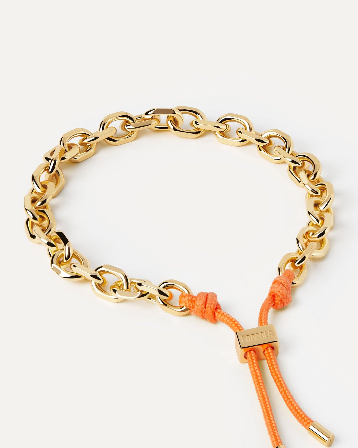 2024 Selection | Tangerine Essential Rope and Chain Bracelet. Silver chain bracelet with interwined orange rope and adjustable sliding clasp. Get the latest arrival from PDPAOLA. Place your order safely and get this Best Seller. Free Shipping.