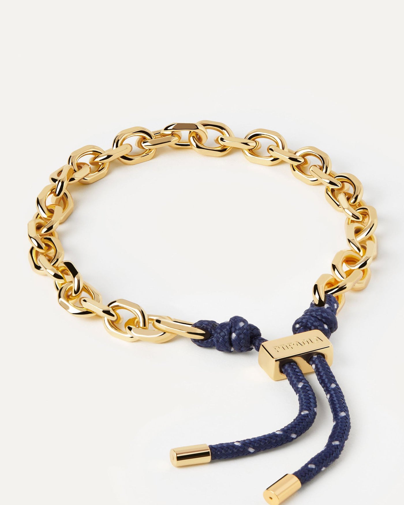 2024 Selection | Midnight Essential Rope and Chain Bracelet. Silver chain bracelet with interwined navy blue rope and adjustable sliding clasp. Get the latest arrival from PDPAOLA. Place your order safely and get this Best Seller. Free Shipping.