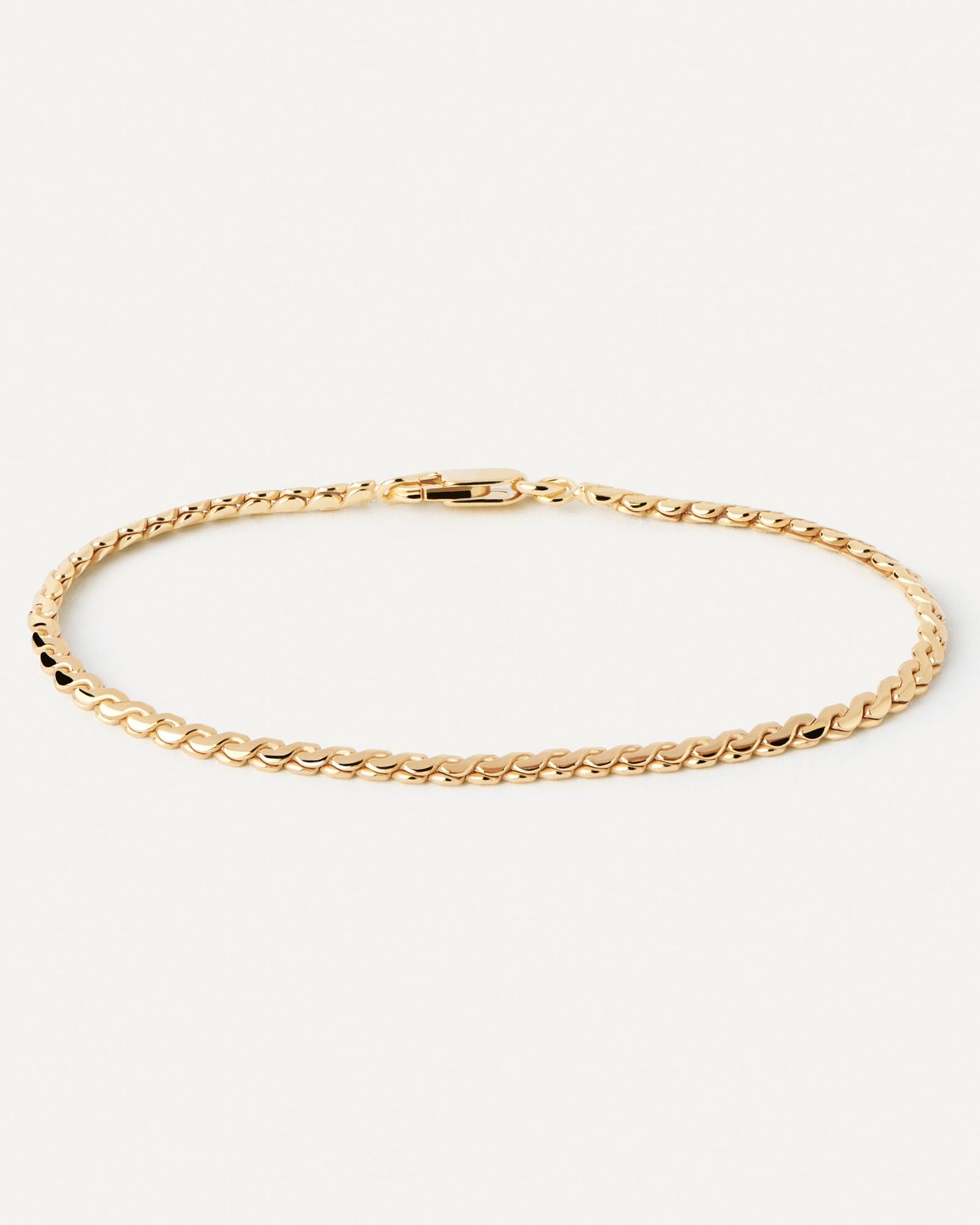 2024 Selection | Serpentine Chain Bracelet. Modern gold-plated serpentine chain bracelet with braided links. Get the latest arrival from PDPAOLA. Place your order safely and get this Best Seller. Free Shipping.