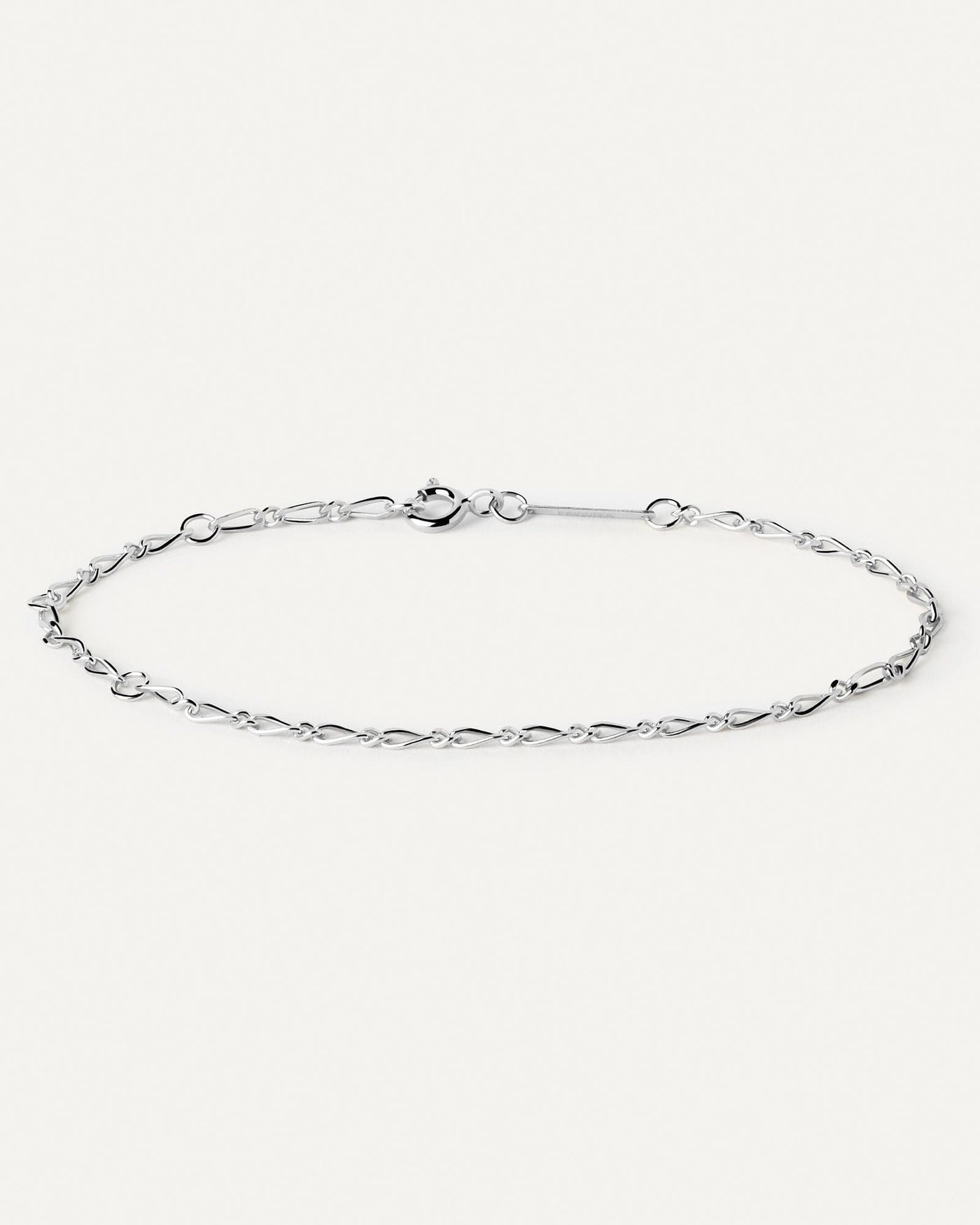 2024 Selection | Adele Silver Chain Bracelet. Sleek silver chain bracelet with intertwined asymmetric links. Get the latest arrival from PDPAOLA. Place your order safely and get this Best Seller. Free Shipping.