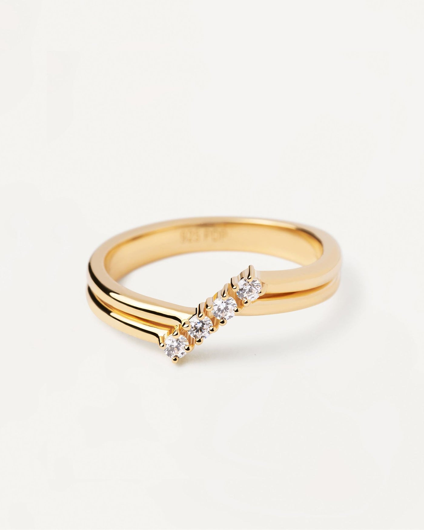 2024 Selection | Anna Ring. Asymetric 4-zirconia ring in gold-plated silver. Get the latest arrival from PDPAOLA. Place your order safely and get this Best Seller. Free Shipping.