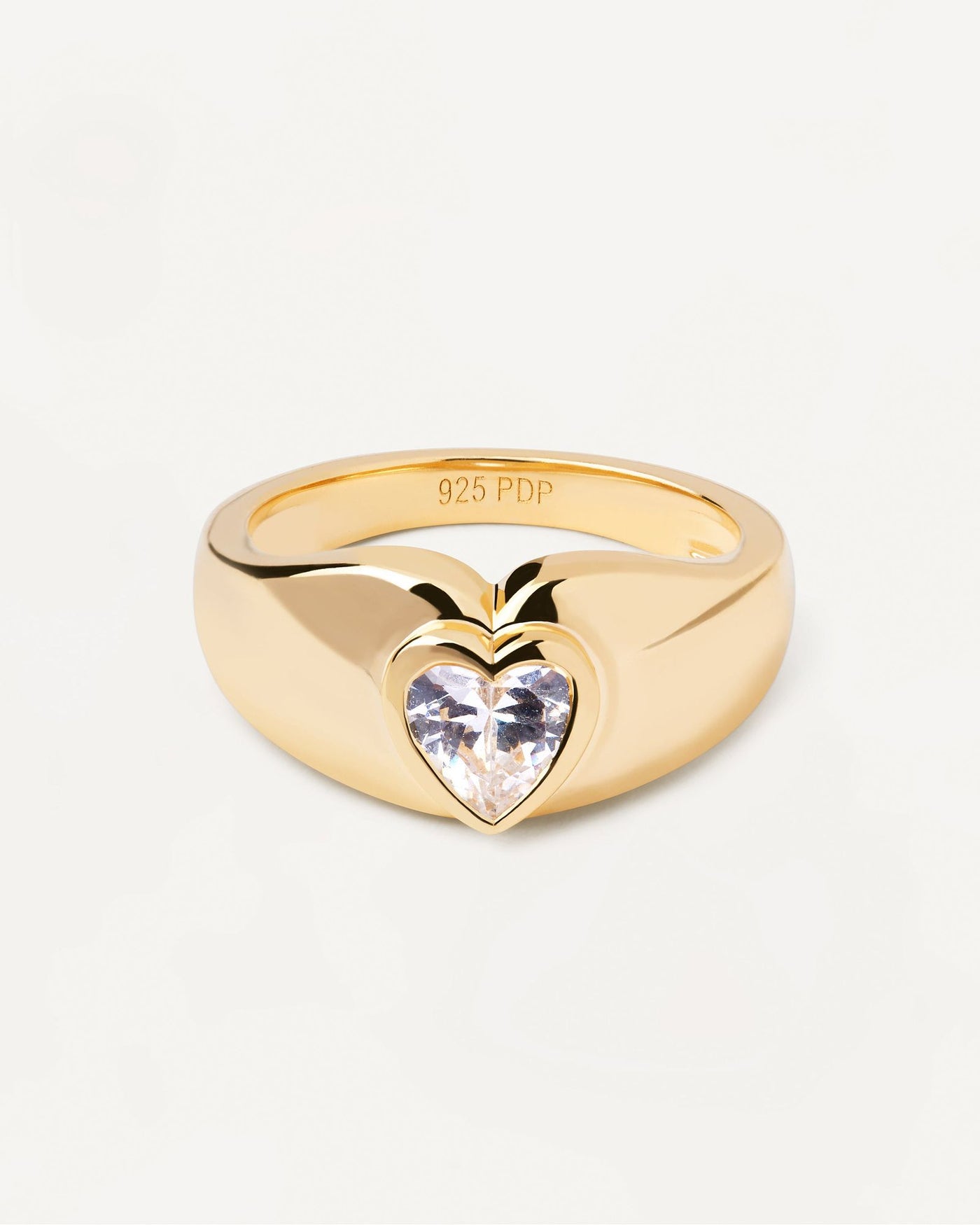 2024 Selection | Bright Heart Ring. Bold ring in gold-plated silver with heart-shaped zirconia. Get the latest arrival from PDPAOLA. Place your order safely and get this Best Seller. Free Shipping.