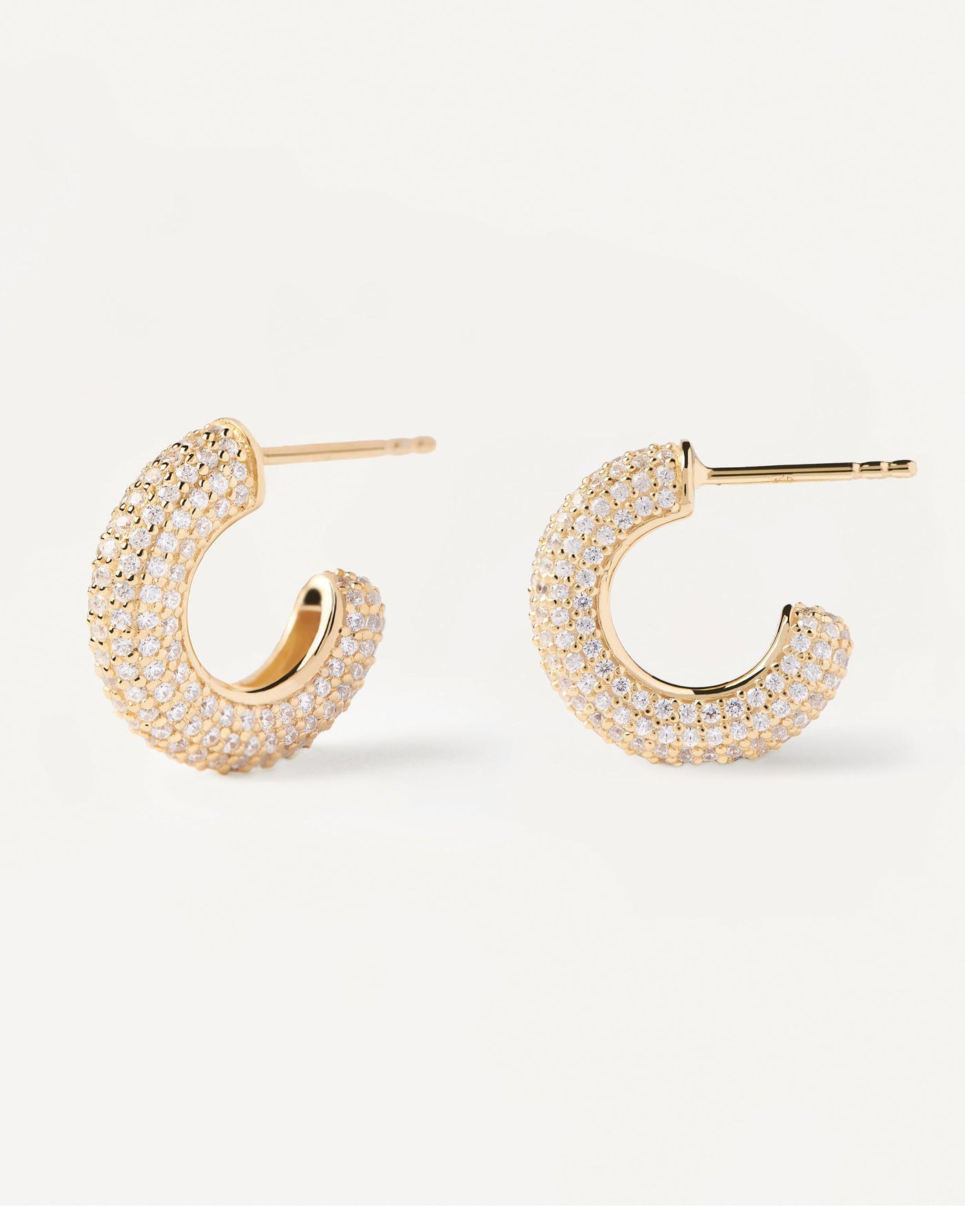 2024 Selection | King Earrings. Gold-plated hoop earrings with white zirconia. Get the latest arrival from PDPAOLA. Place your order safely and get this Best Seller. Free Shipping.