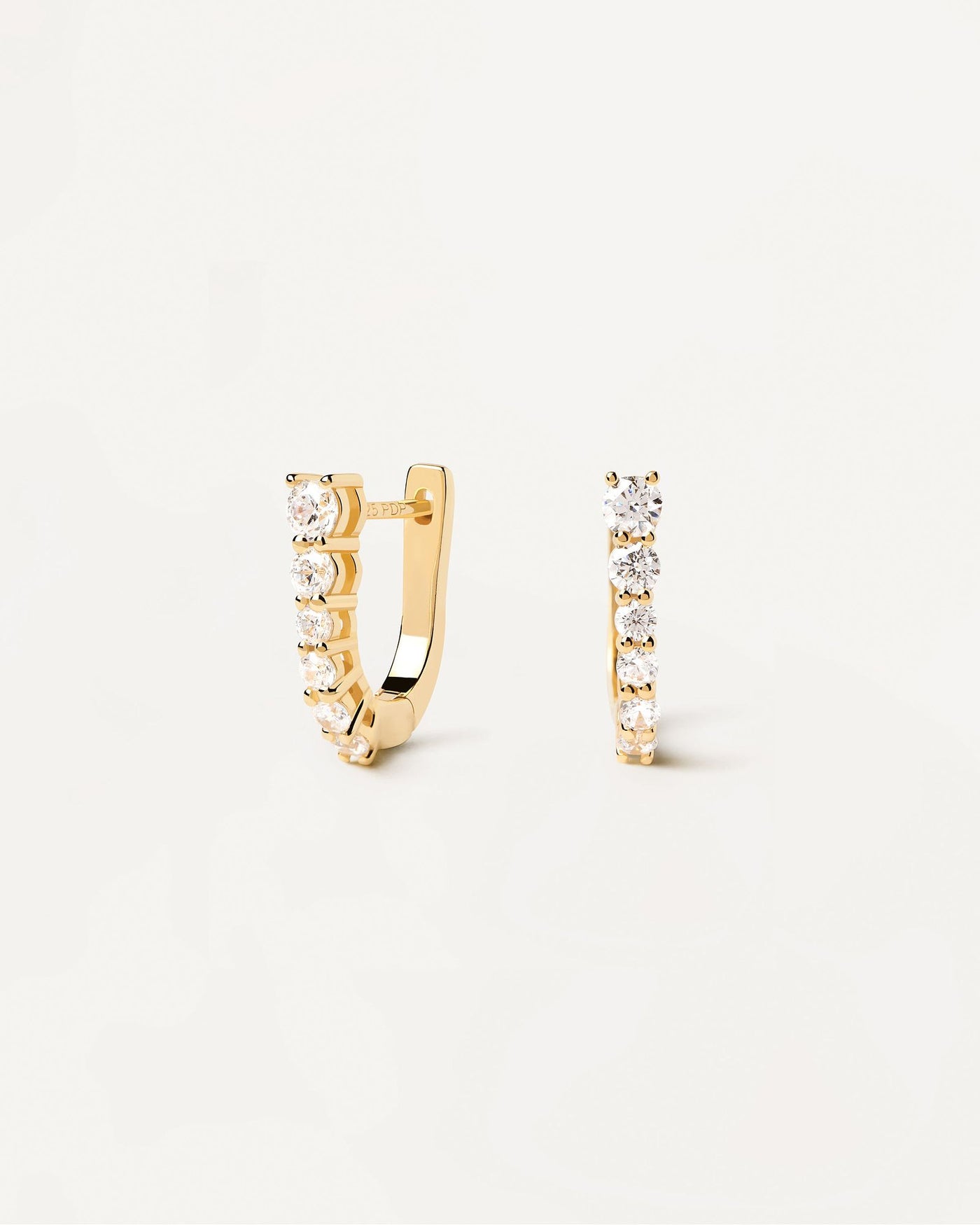 2024 Selection | Rise Earrings. Dainty hoops in gold-plated silver with white zirconia. Get the latest arrival from PDPAOLA. Place your order safely and get this Best Seller. Free Shipping.