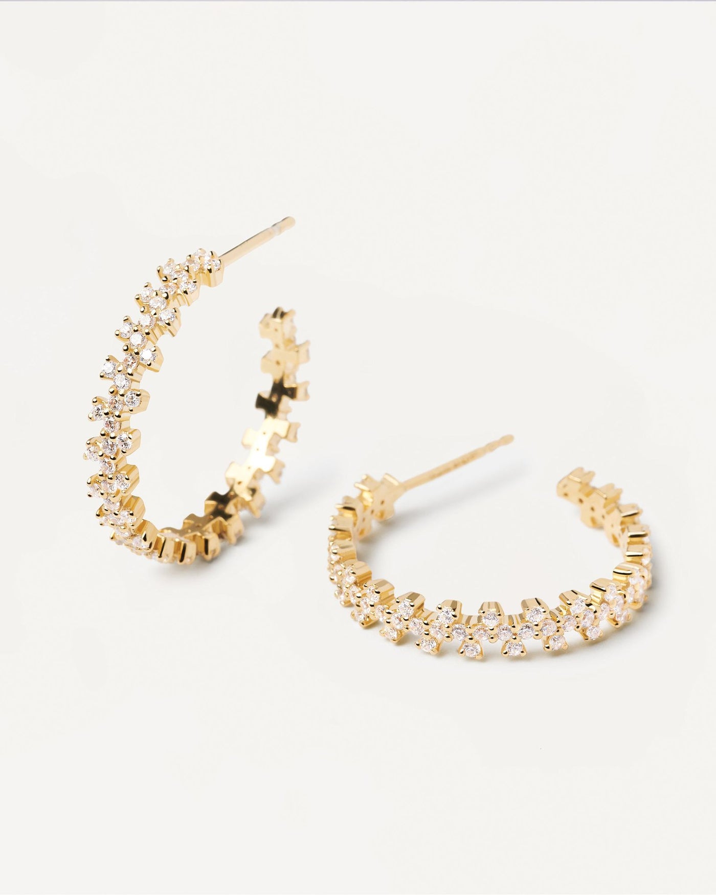 2024 Selection | Crown Earrings. Gold-plated hoop earrings with white zirconia. Get the latest arrival from PDPAOLA. Place your order safely and get this Best Seller. Free Shipping.