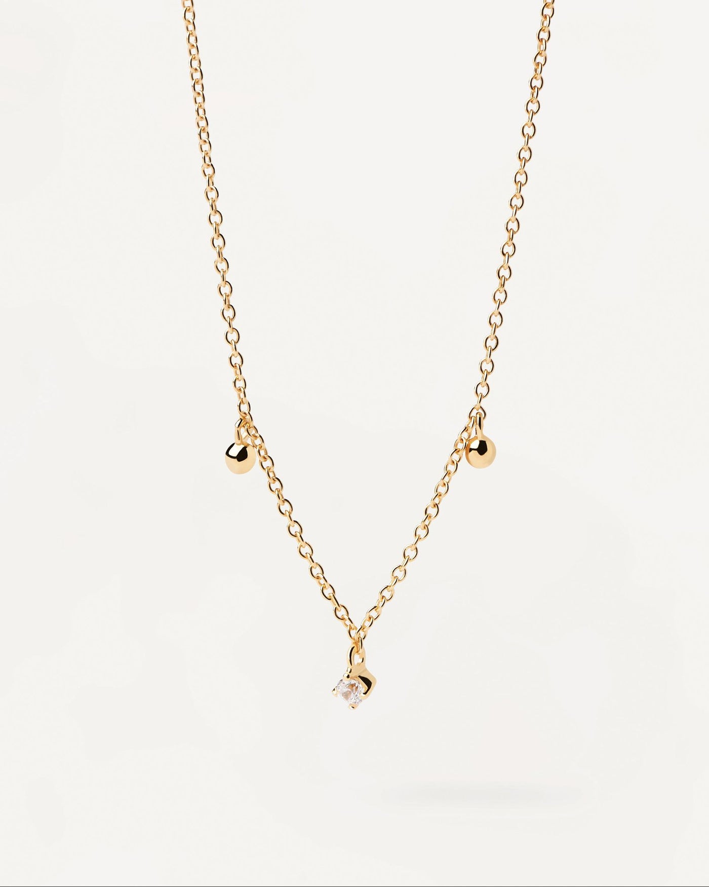 2024 Selection | Love Triangle Necklace. Gold-plated chain necklace with dainty balls and white zirconia. Get the latest arrival from PDPAOLA. Place your order safely and get this Best Seller. Free Shipping.