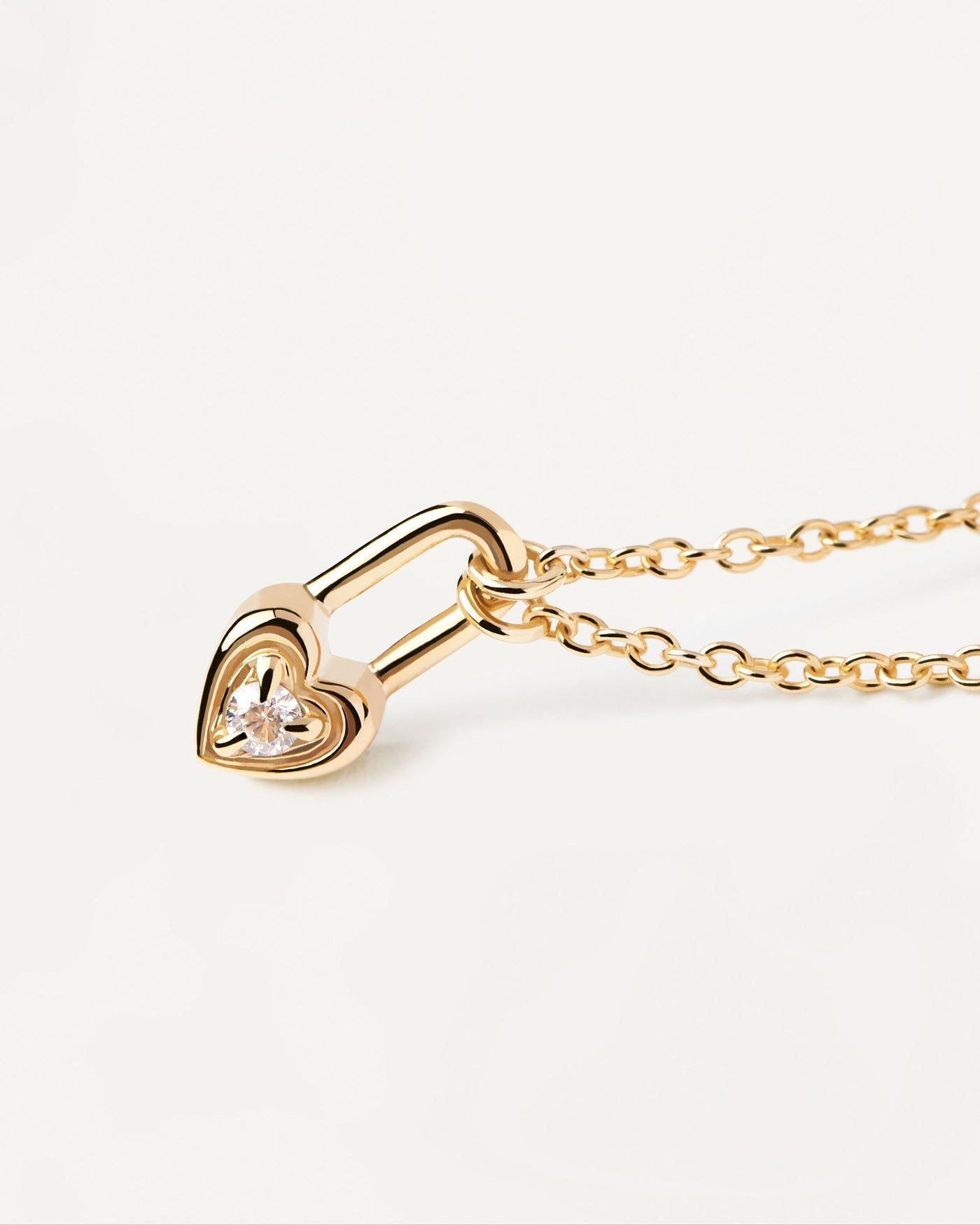 2024 Selection | Heart Padlock Necklace. Gold-plated necklace with heart padlock pendant set with white zirconia. Get the latest arrival from PDPAOLA. Place your order safely and get this Best Seller. Free Shipping.