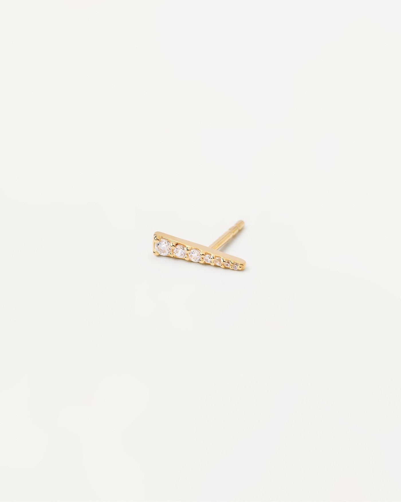 2024 Selection | Tea Single Earring. Gold-plated ear piercing in tip shape with white crystals. Get the latest arrival from PDPAOLA. Place your order safely and get this Best Seller. Free Shipping.