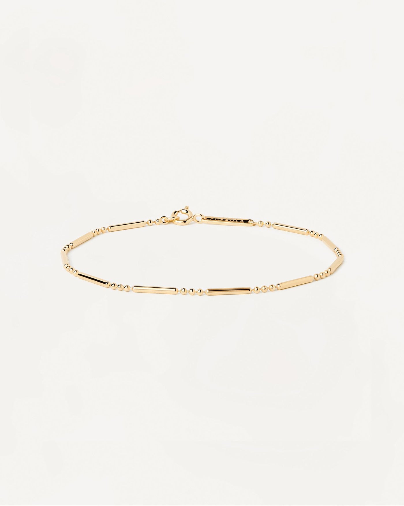 2024 Selection | Valeria Bracelet. Ball and bar textured bracelet in gold-plated silver. Get the latest arrival from PDPAOLA. Place your order safely and get this Best Seller. Free Shipping.