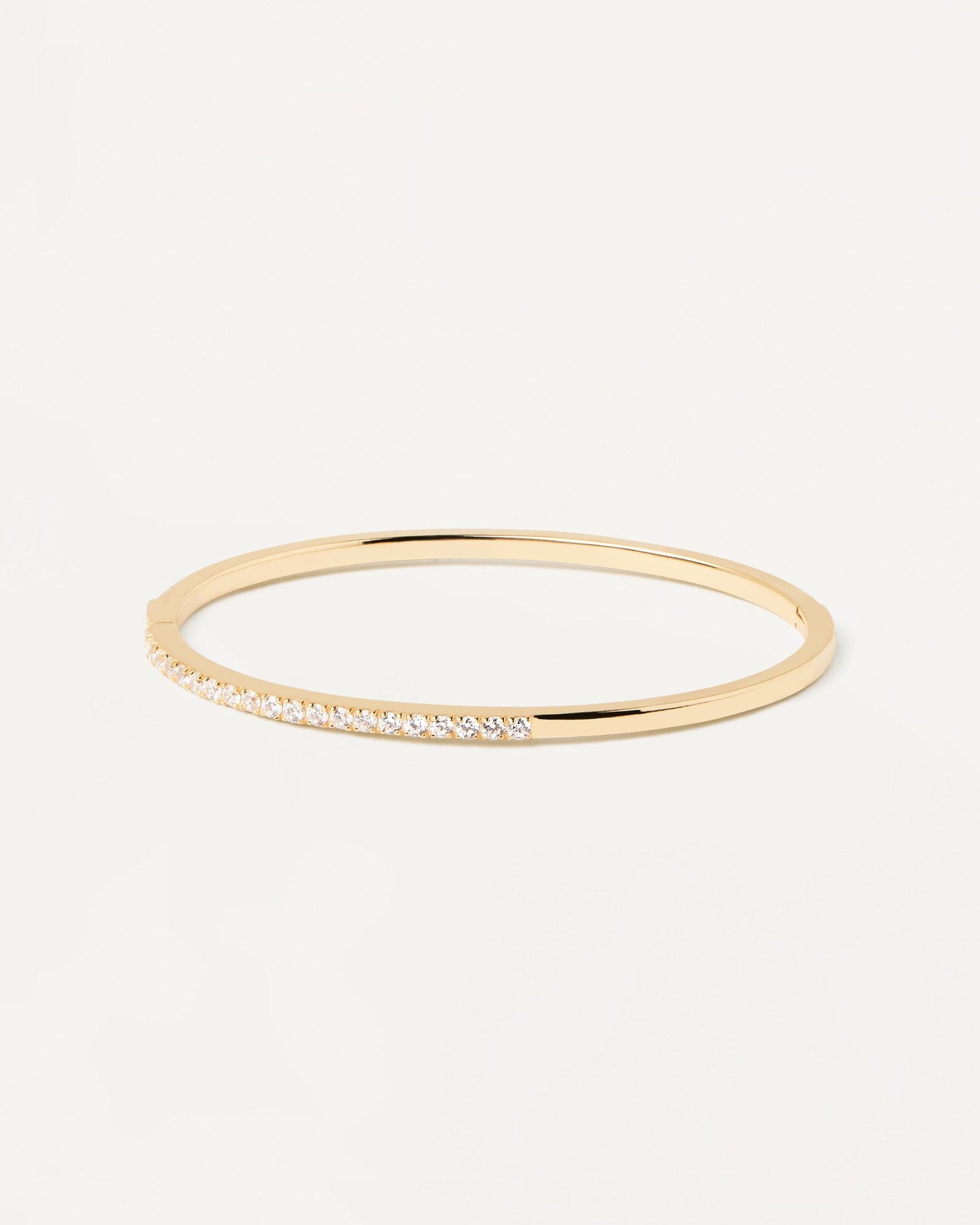 2024 Selection | April Bangle. Gold-plated silver hinged rigid bracelet with 2 bands of white zirconia. Get the latest arrival from PDPAOLA. Place your order safely and get this Best Seller. Free Shipping.