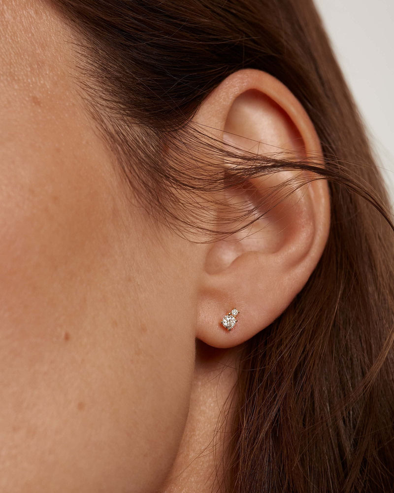 Diamonds and Gold Asymetric Studs - 
  
    18K Gold
  
