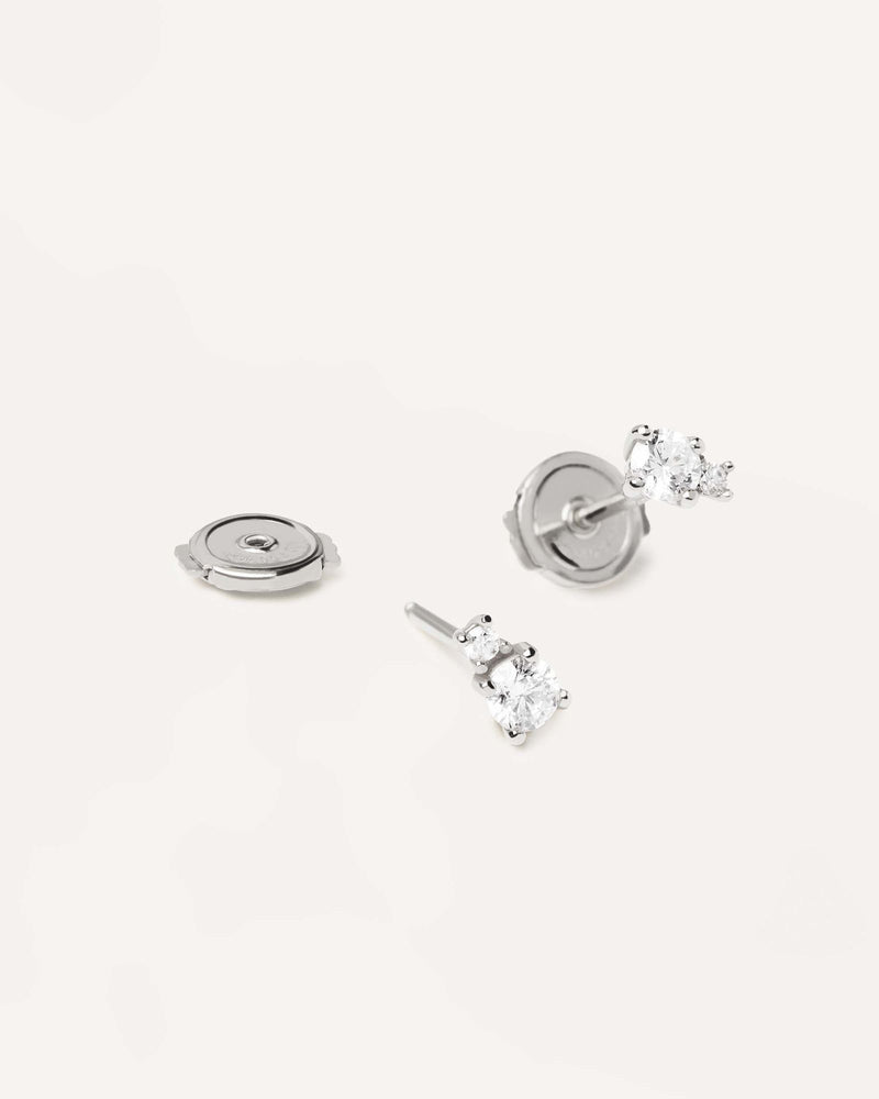 Diamonds and White Gold Solitaire Duo Studs - 
  
    18K White gold / Rhodium silver plating
  
