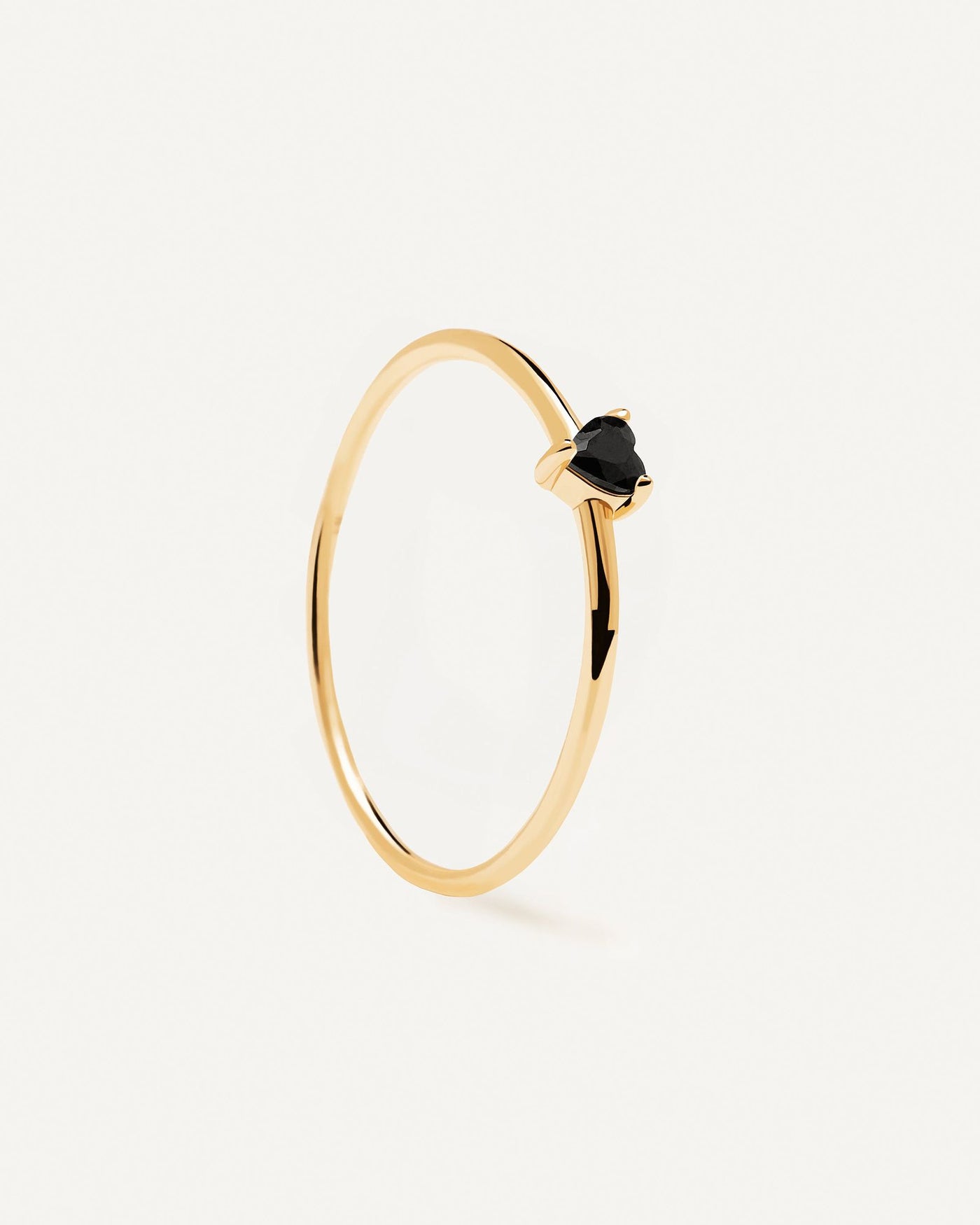 2024 Selection | Black Heart Ring. Heart-shaped black zirconia stone prong-set on a thin 18k gold plated ring. Get the latest arrival from PDPAOLA. Place your order safely and get this Best Seller. Free Shipping.