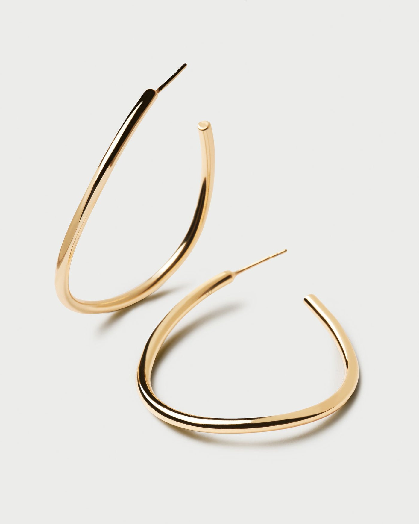 2024 Selection | Yoko Earrings. Open loop large wavy hoop earrings in 18k gold plated silver. Get the latest arrival from PDPAOLA. Place your order safely and get this Best Seller. Free Shipping.