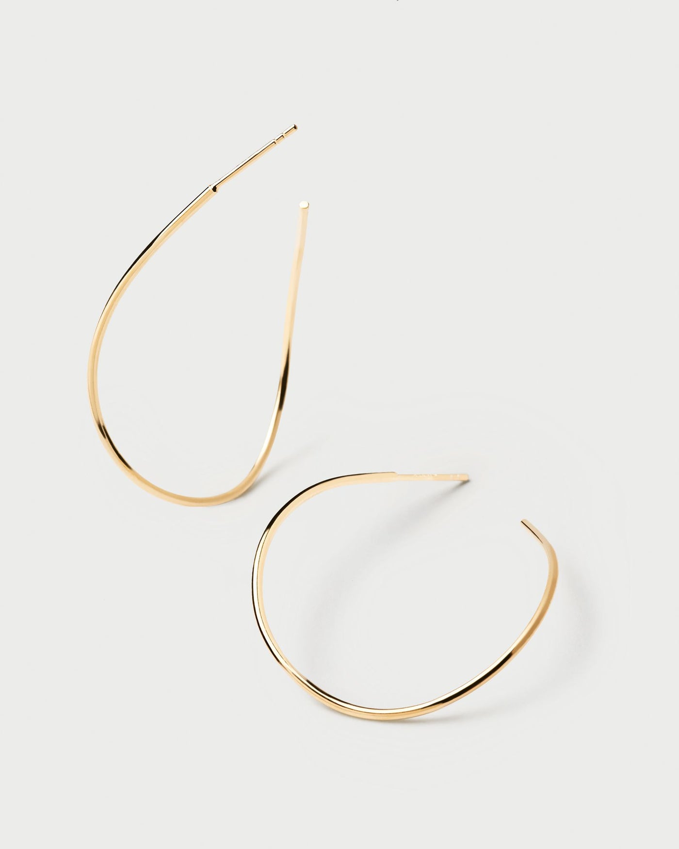 2024 Selection | Niko Earrings. Open loop wavy oval hoop earrings in 18k gold plated silver. Get the latest arrival from PDPAOLA. Place your order safely and get this Best Seller. Free Shipping.