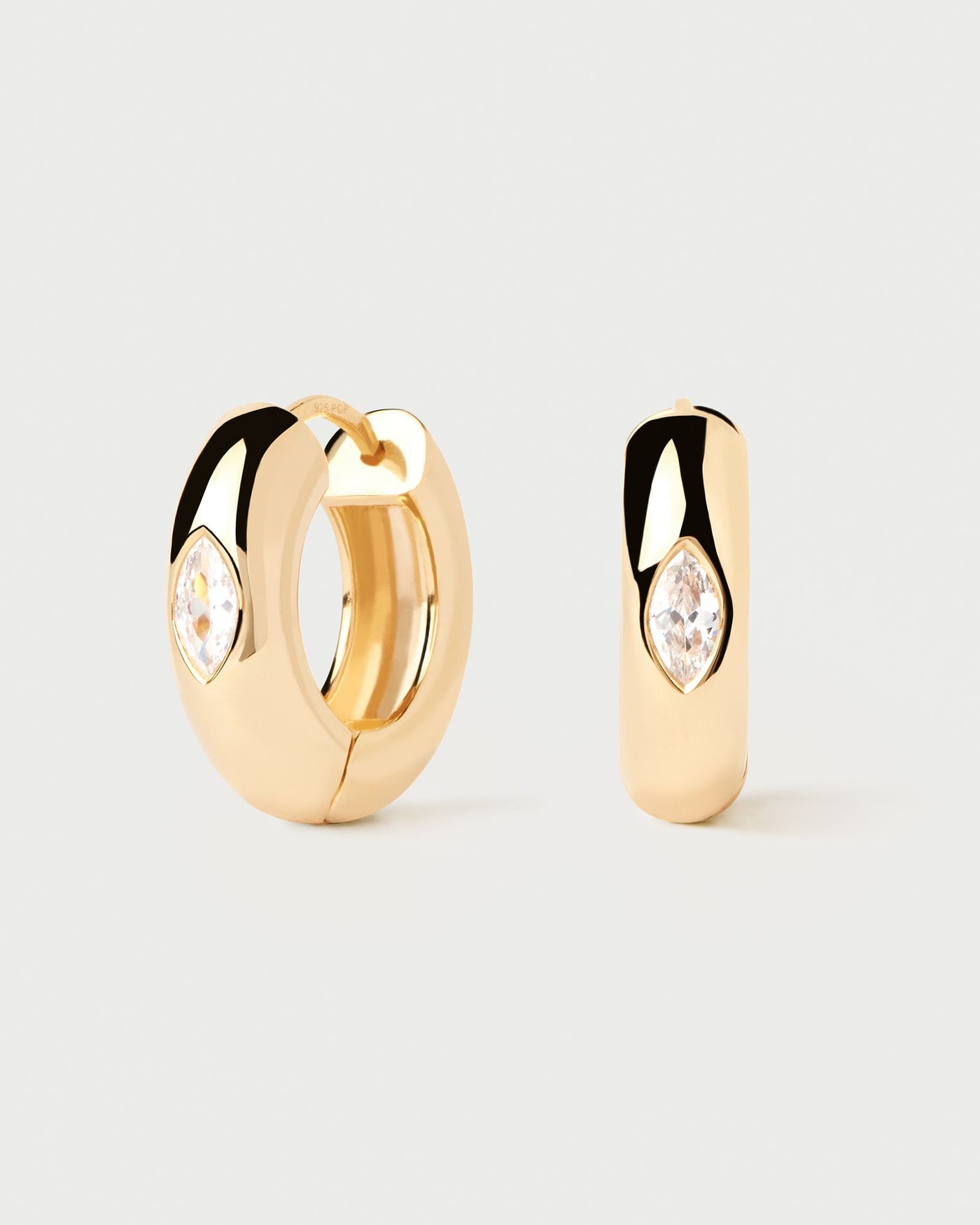 2024 Selection | Ura Hoop Earrings. Bold hoop earrings in gold-plated silver with oval white zirconia. Get the latest arrival from PDPAOLA. Place your order safely and get this Best Seller. Free Shipping.