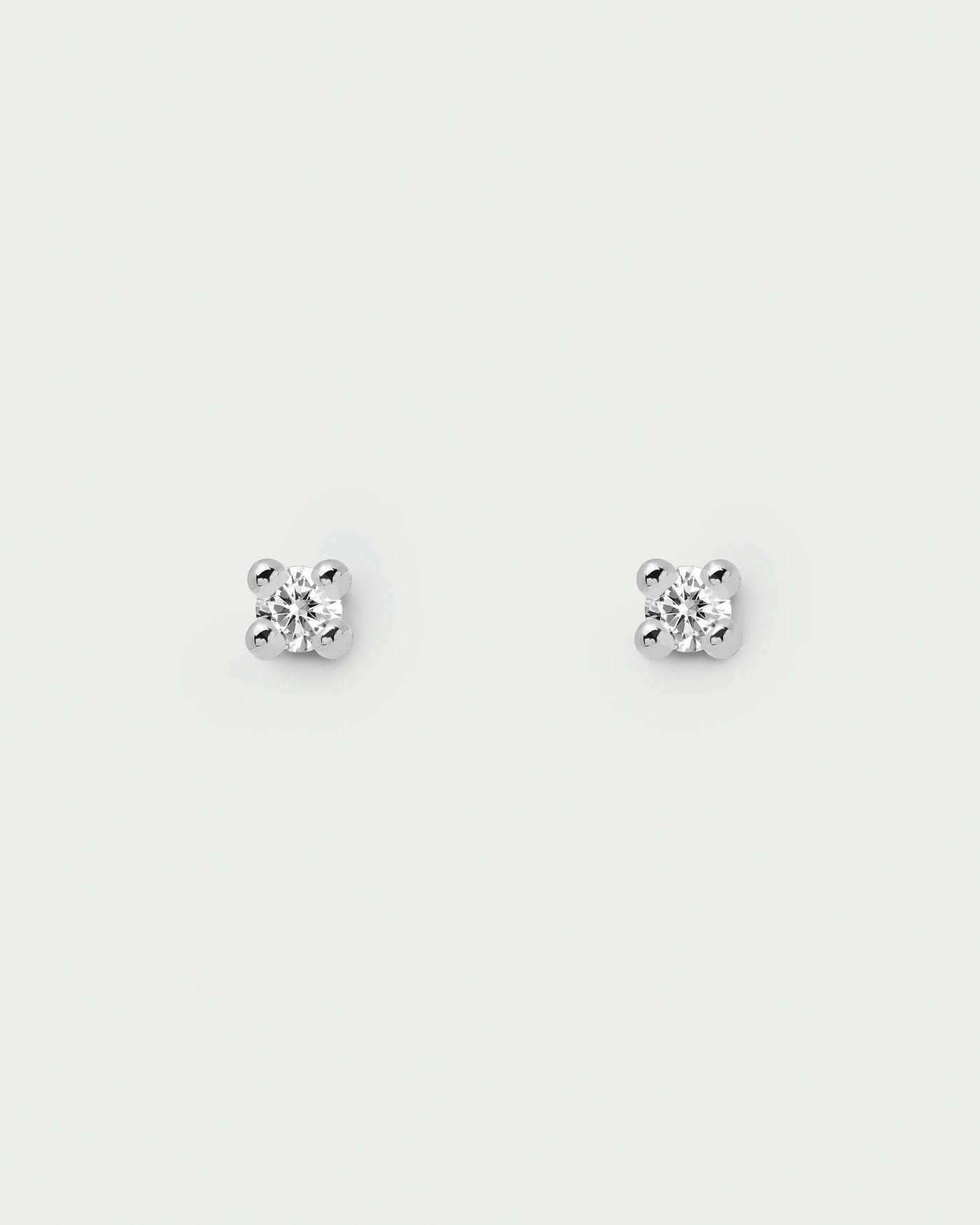 2024 Selection | Essentia Silver Earrings. Pair of 925 sterling silver stud earrings set with a white zirconia stone. Get the latest arrival from PDPAOLA. Place your order safely and get this Best Seller. Free Shipping.