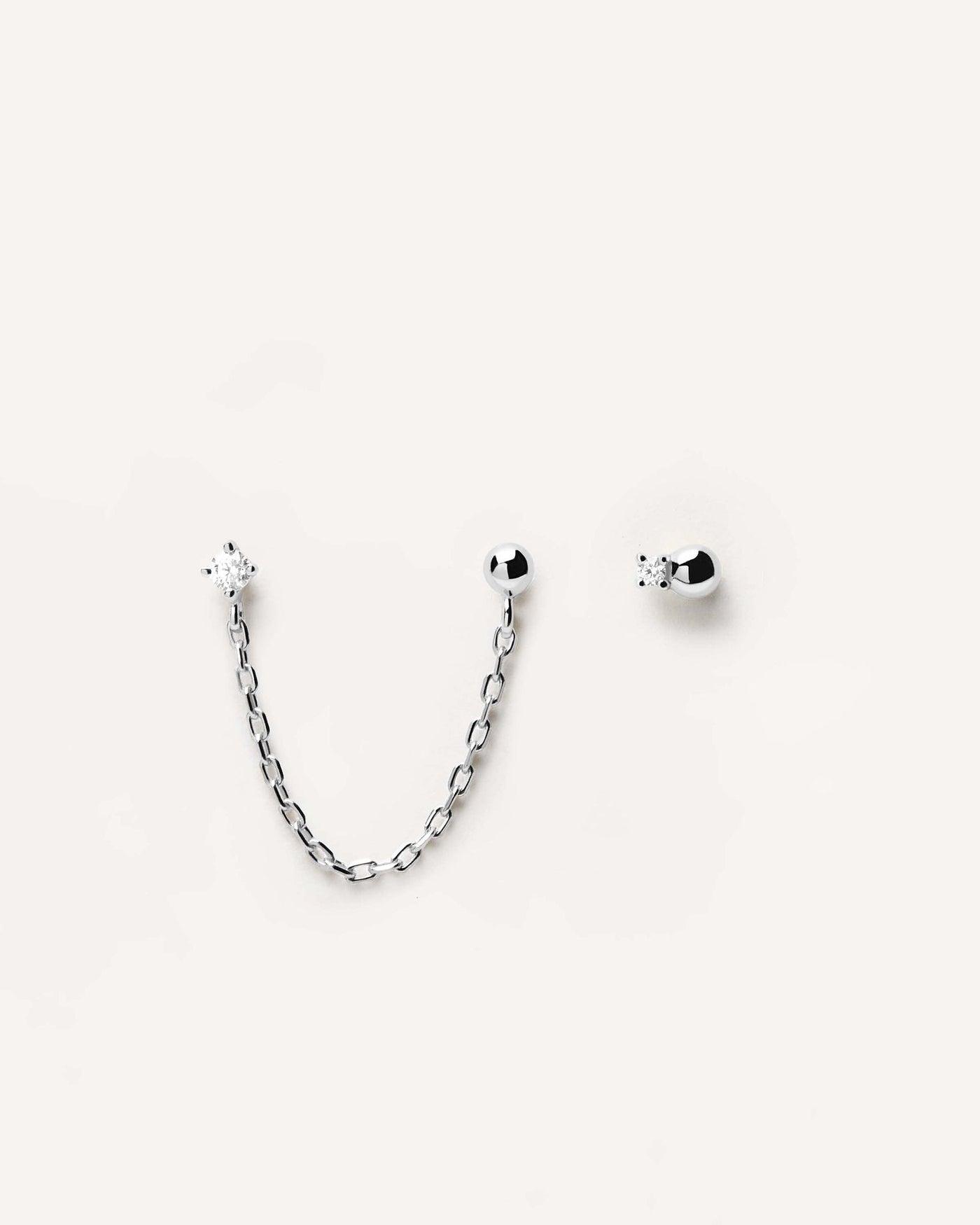 2024 Selection | Musketeer Silver Earrings. Chain linked and single 925 sterling silver studs set with two white zirconia stones. Get the latest arrival from PDPAOLA. Place your order safely and get this Best Seller. Free Shipping.
