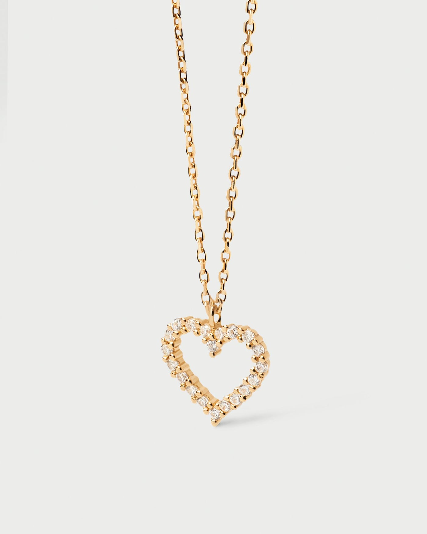 2024 Selection | White Heart Necklace. Heart pendant set with white zirconia stones on a 18k gold plated single link chain necklace. Get the latest arrival from PDPAOLA. Place your order safely and get this Best Seller. Free Shipping.