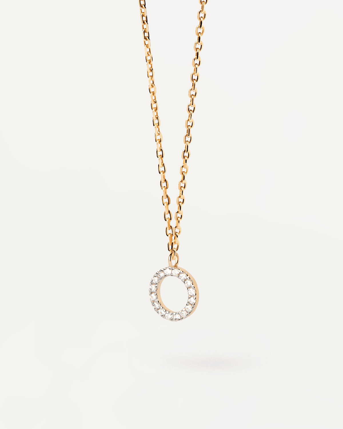 Diamonds and gold Circle necklace. Solid yellow gold necklace with a circular pendant with lab-grown diamonds of 0.06 carats. Get the latest arrival from PDPAOLA. Place your order safely and get this Best Seller.