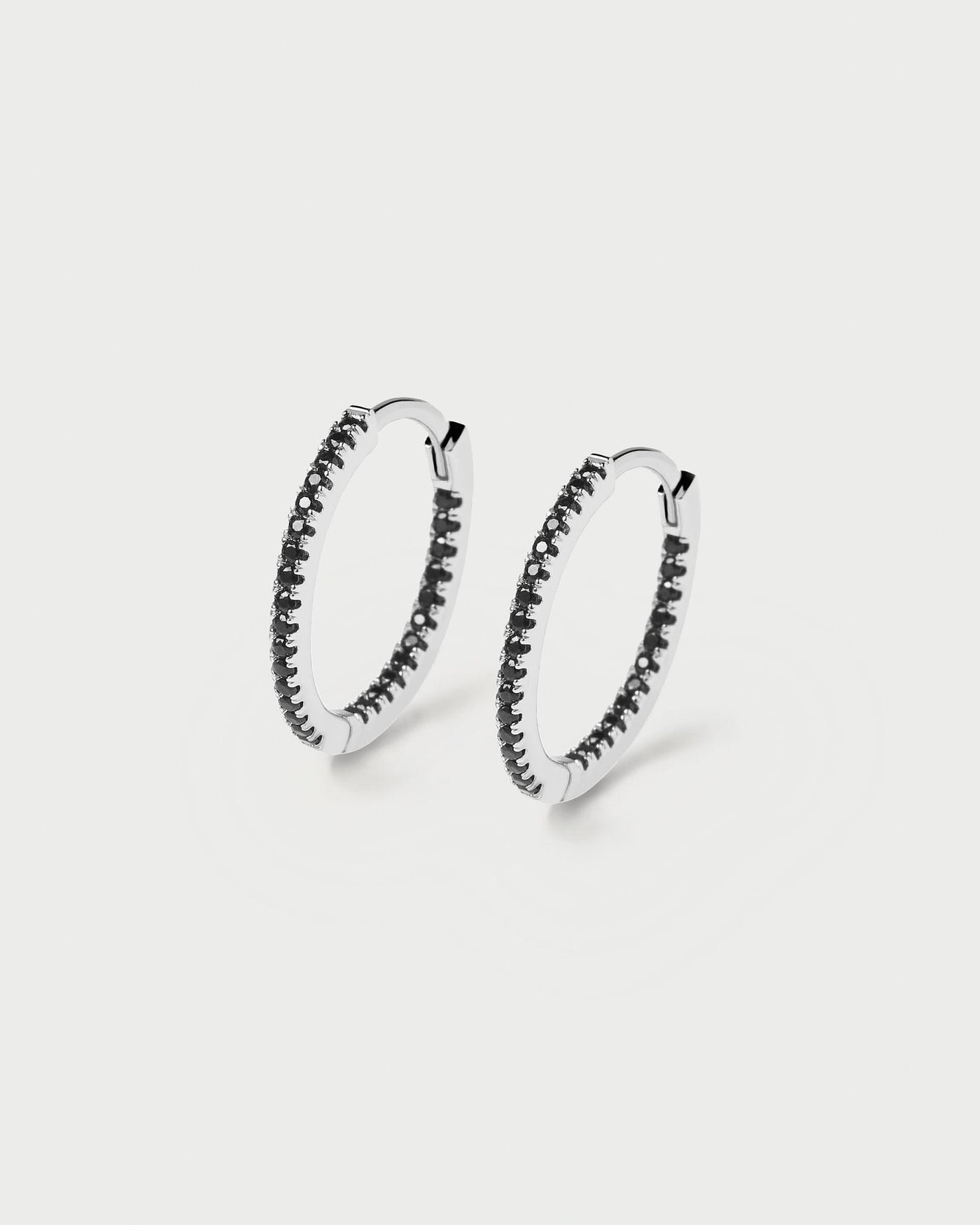 2024 Selection | Black Medium Hoops Silver. Full hoop latch-back earrings in sterling silver set with black zirconia. Get the latest arrival from PDPAOLA. Place your order safely and get this Best Seller. Free Shipping.
