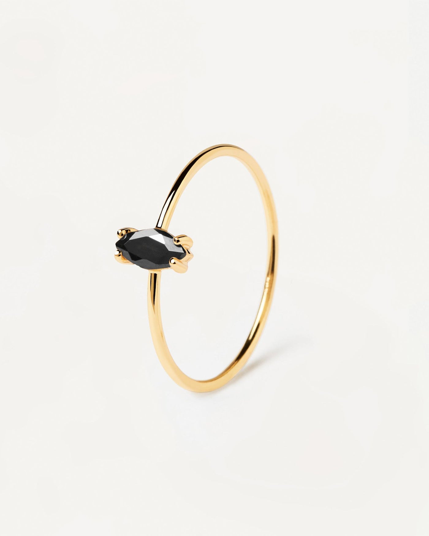2024 Selection | Black India Ring. Elegant marquise cut black zirconia prong-set on a slim 18k gold plated ring. Get the latest arrival from PDPAOLA. Place your order safely and get this Best Seller. Free Shipping.
