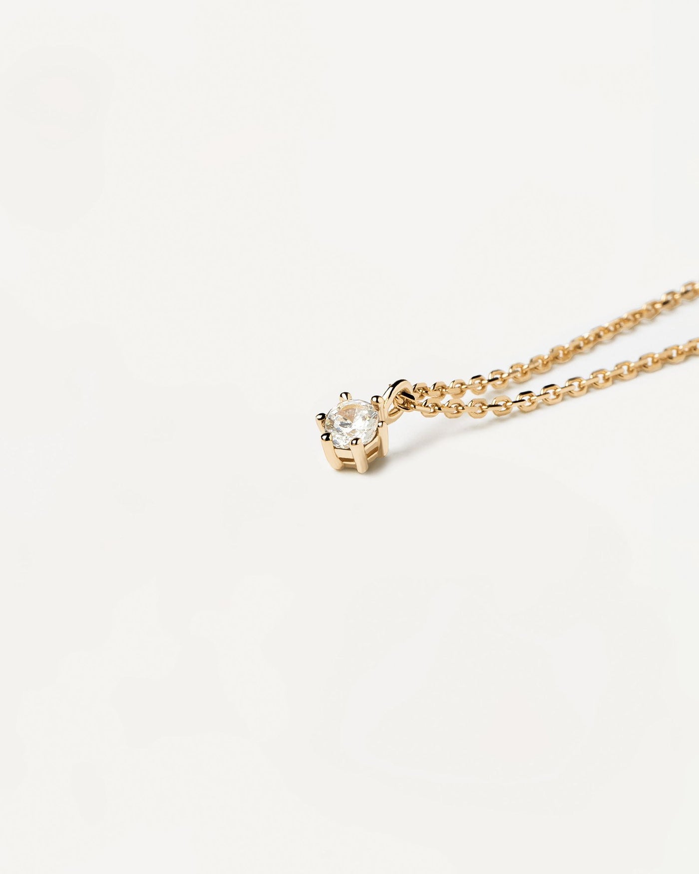 2024 Selection | White Solitary Necklace. Single link chain necklace in 18k gold plated silver with a white zirconia on prongs. Get the latest arrival from PDPAOLA. Place your order safely and get this Best Seller. Free Shipping.