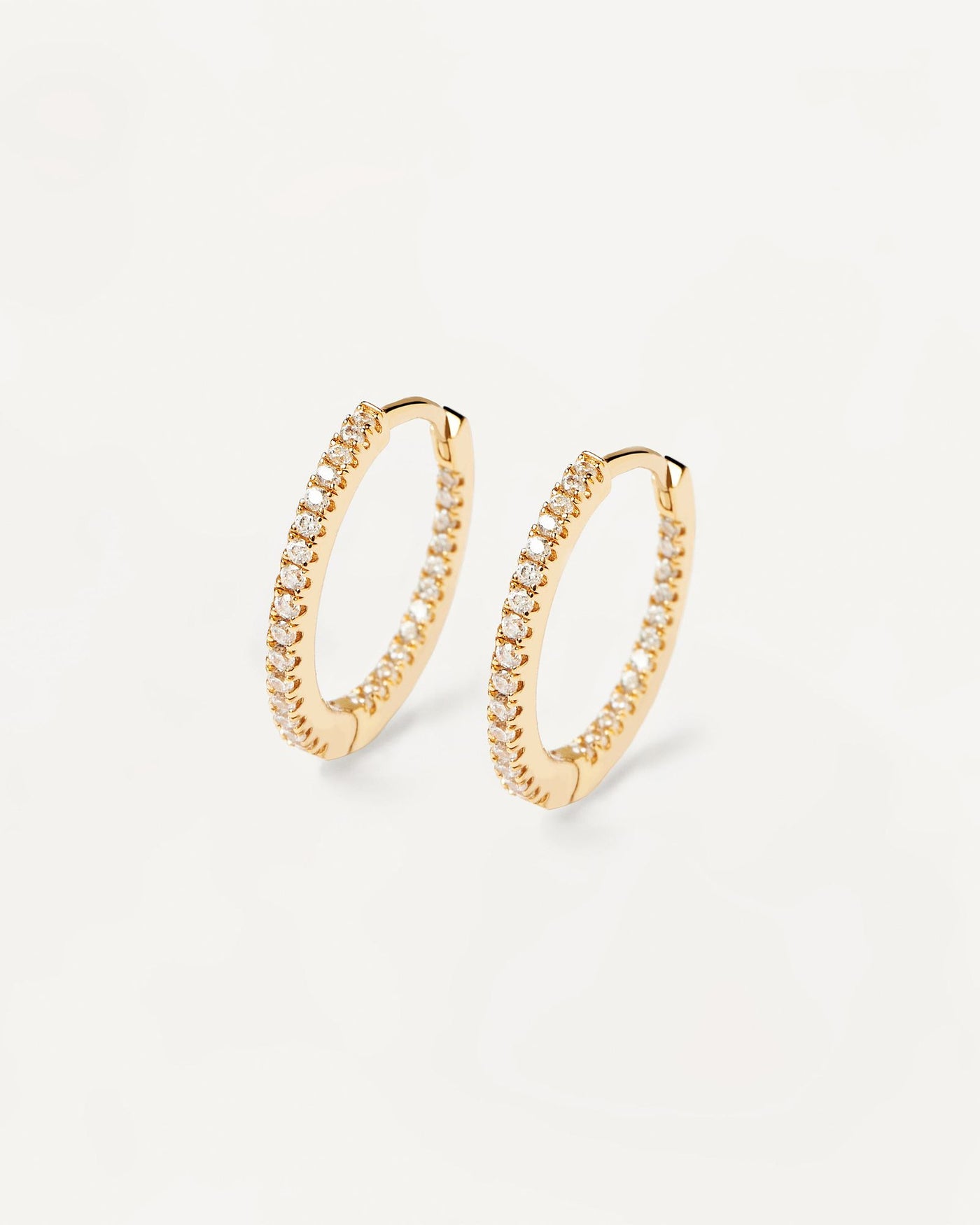 2024 Selection | White Medium Hoops. Full hoop latch-back earrings in 18k gold plated silver set with white zirconia. Get the latest arrival from PDPAOLA. Place your order safely and get this Best Seller. Free Shipping.